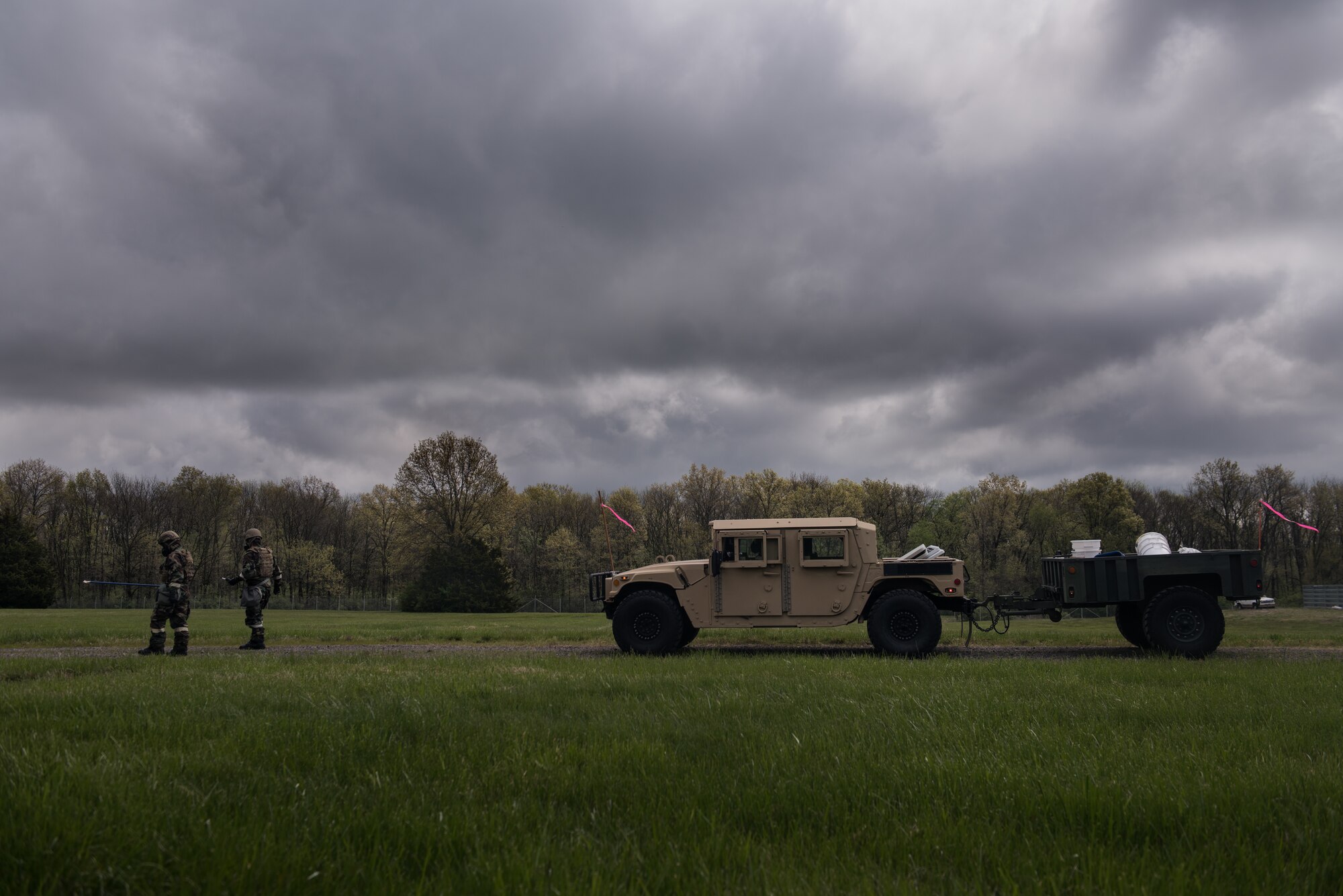 509th Engineer Squadron Explosive Ordinance Disposal technicians, walk towards a simulated chemical ordinance during training at Whiteman Air Force Base, Missouri, April 30, 2020. During the COVID-19 pandemic Whiteman’s EOD team remains mission capable and are ready to respond to threats throughout the region. (U.S. Air Force photo by Senior Airman Thomas Barley)