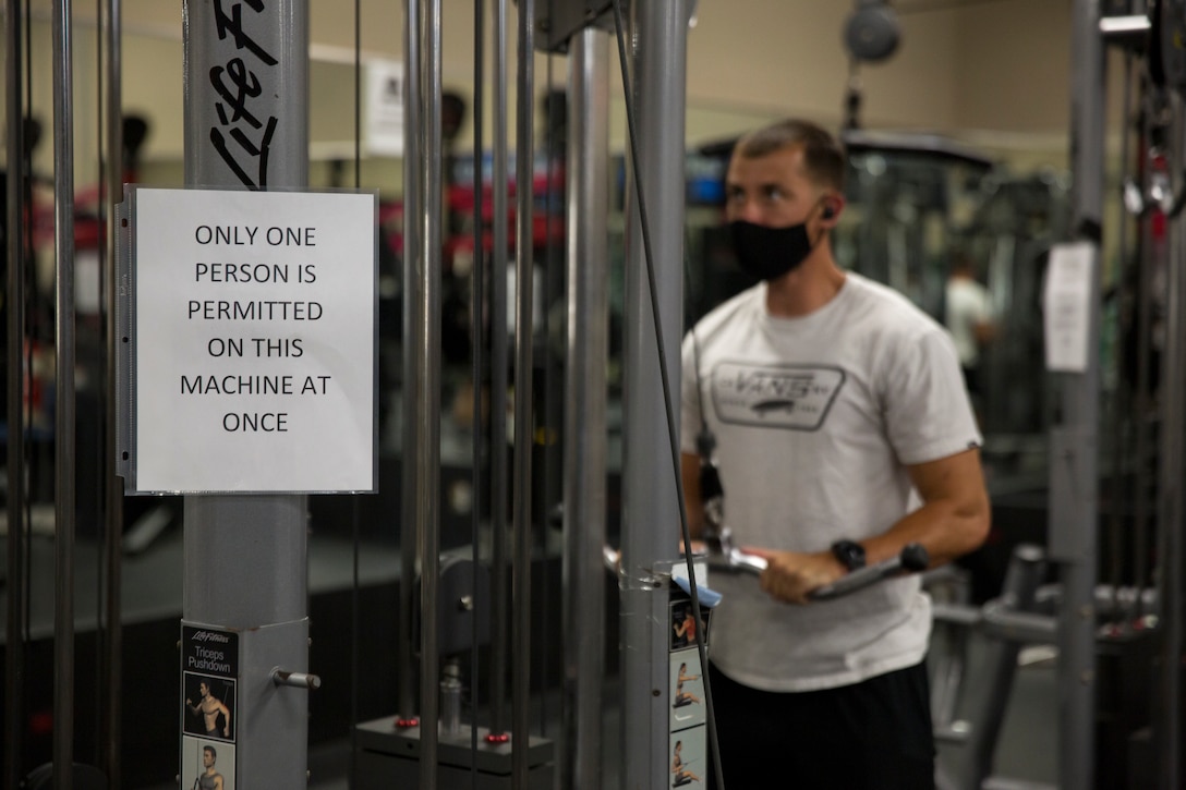 A service member works out at the station gym on Marine Corps Air Station Yuma, April 30, 2020. The gym reopend with extra precautions set in place to keep service members and gym employees safe. (U.S. Marine Corps Photo by Cpl. Nicole Rogge)
