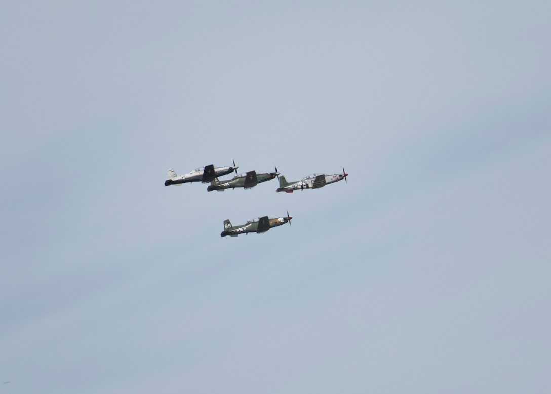 Four T-6 Texan II aircraft participate in the Spirit of Texoma flyover on May 1, 2020. The flyover was a way for Sheppard Air Force Base, Texas, to show gratitude towards the COVID-19 frontline healthcare workers in the local community. The flyover consisted of a 4-ship T-38 Talon formation and a 4-ship T-6 Texan II formation, with a T-38 and T-6 chase plane behind them for photo and video. (U. S. Air Force photo by Senior Airman Pedro Tenorio)