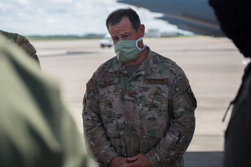 Col. Adam Willis, 315th Airlift Wing commander, discusses the Transport Isolation System at Joint Base Charleston, S.C., April 30, 2020. Willis was part of a tour given to Chief of Staff of the Air Force Gen. David Goldfein, and Chief Master Sgt. of the Air Force Kaleth O. Wright, who visited JB Charleston to observe current aeromedical evacuation TIS operations and Palmetto Spark, JB Charleston’s innovation cell. The TIS is a system designed to safely transport infectious patients by aircraft and is being used as part of the Department of Defense’s COVID-19 response. Palmetto Spark allows Airmen to get help with coming up with innovative ideas for their squadron and has been making protective gear for non-medical personnel and hand sanitizer for units across JB Charleston. (U.S. Air Force photo by Airman Sara Jenkins)