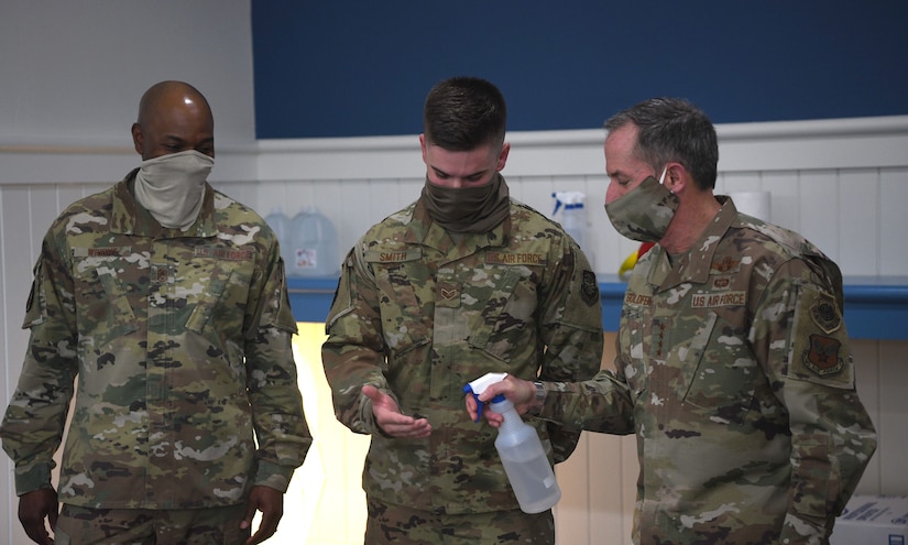 Chief of Staff of the Air Force General David L. Goldfein and Chief Master Sergeant of the Air Force Kaleth O. Wright test out the hand sanitizer produced at the Palmetto Spark innovation group at Joint Base Charleston, S.C., April 30, 2020. The group was created along with many other innovation focused Air Mobility groups to promote new ideas from the squadron level as well as ways to solve problems in new ways. (U.S. Air Force photo by Senior Airman Cody R. Miller)