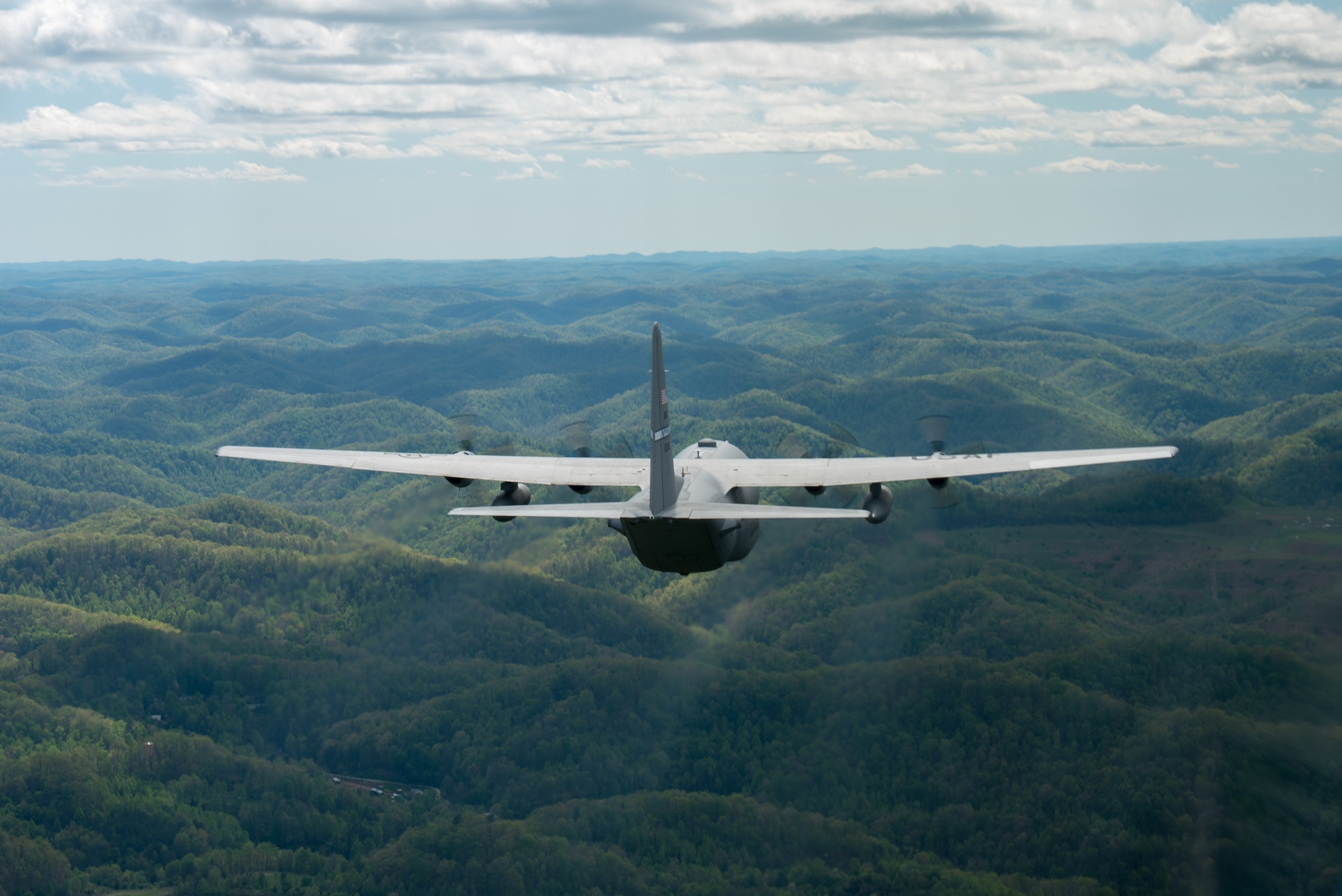 A Kentucky Air National Guard C-130 Hercules flies over the commonwealth of Kentucky as part of Operation American Resolve on Friday, May 1, 2020.  The 123rd Airlift Wing sent two C-130s for the aerial demonstration that is a nationwide salute to all those supporting COVID-19 response efforts. The flyover is intended to lift morale during a time of severe health and economic impacts that have resulted from COVID-19. (U.S. Air National Guard photo by Phil Speck)