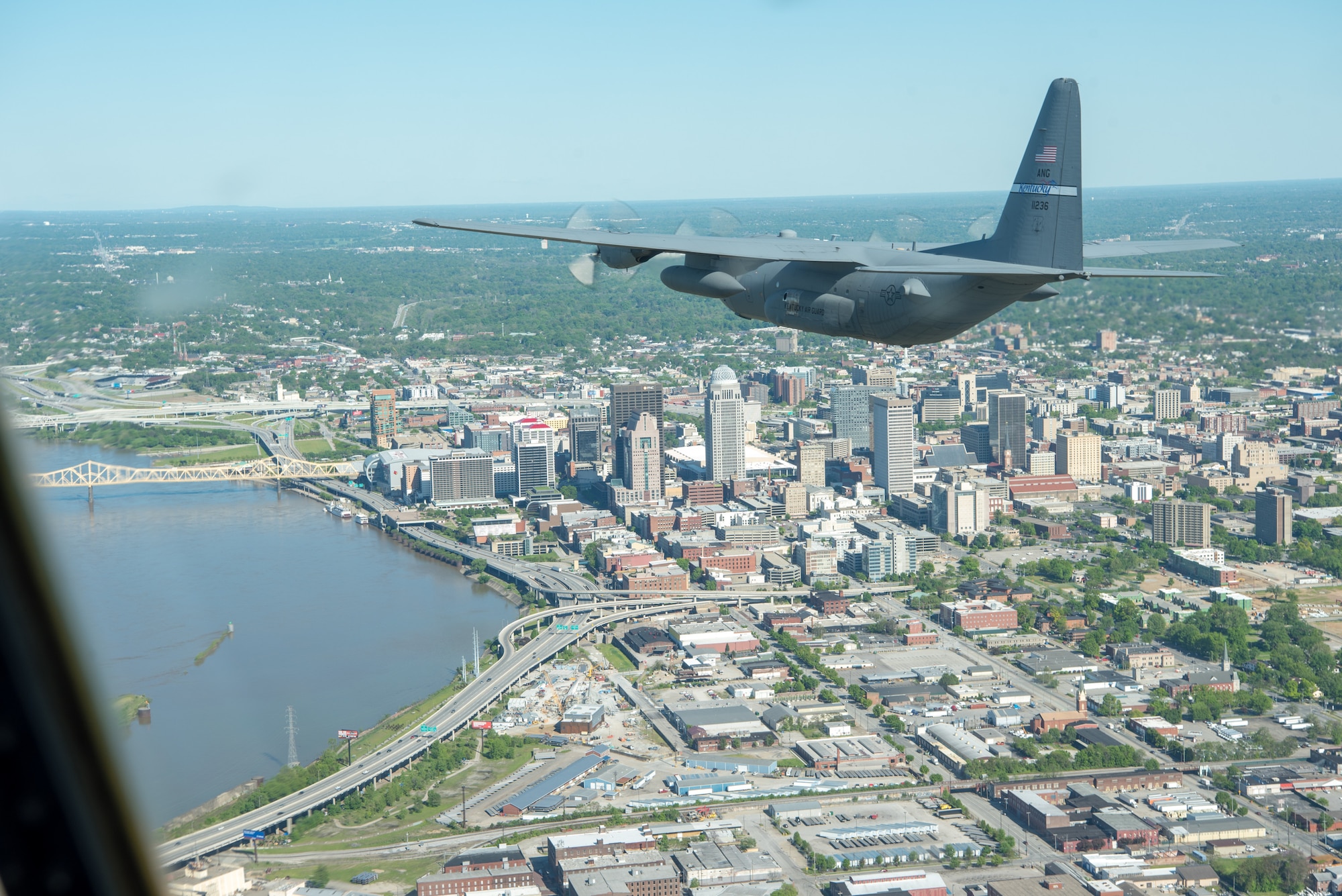 A Kentucky Air National Guard C-130 Hercules flies over the commonwealth of Kentucky as part of Operation American Resolve on Friday, May 1, 2020.  The 123rd Airlift Wing sent two C-130s for the aerial demonstration that is a nationwide salute to all those supporting COVID-19 response efforts. The flyover is intended to lift morale during a time of severe health and economic impacts that have resulted from COVID-19. (U.S. Air National Guard photo by Phil Speck)