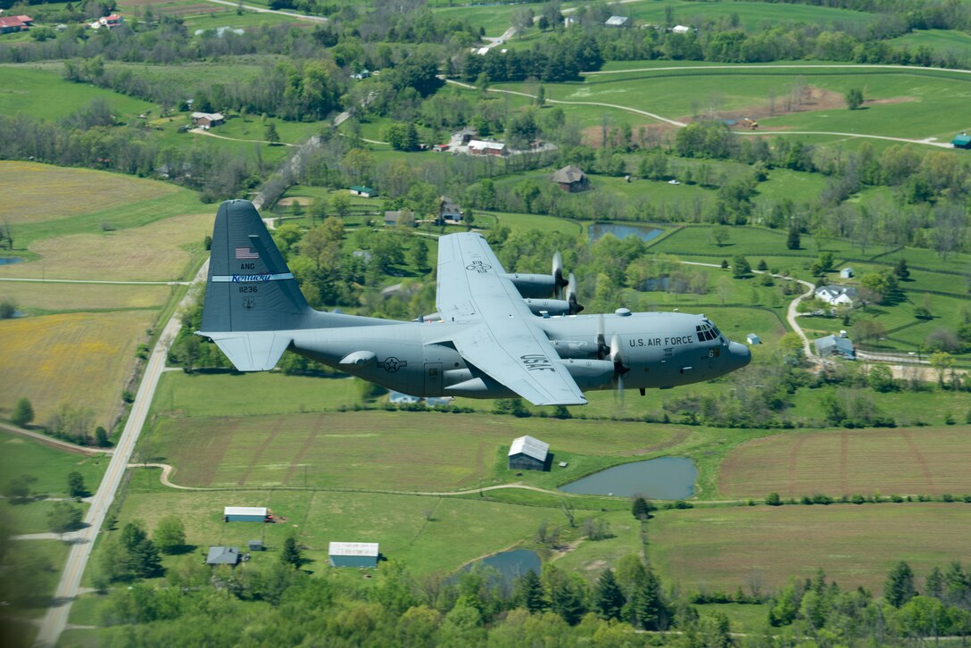 A Kentucky Air National Guard C-130 Hercules flies over the commonwealth of Kentucky as part of Operation American Resolve on Friday, May 1, 2020.  The 123rd Airlift Wing sent two C-130s for the aerial demonstration that is a nationwide salute to all those supporting COVID-19 response efforts. The flyover is intended to lift morale during a time of severe health and economic impacts that have resulted from COVID-19. (U.S. Air National Guard photo by Phil Speck)