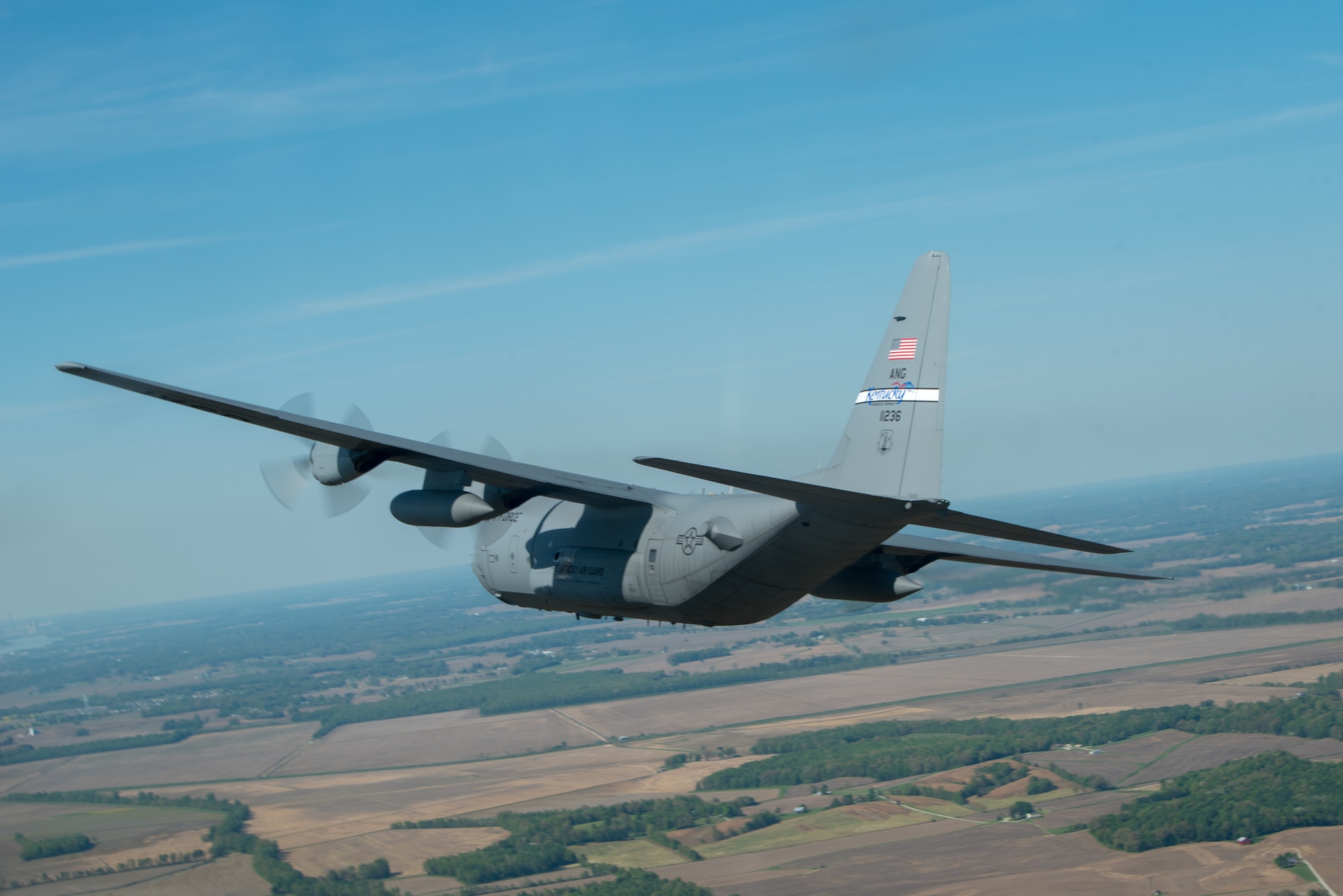 A Kentucky Air National Guard C-130 Hercules flies over the commonwealth of Kentucky as part of Operation American Resolve on Friday, May 1, 2020.  The 123rd Airlift Wing sent two C-130s for the aerial demonstration that is a nationwide salute to all those supporting COVID-19 response efforts. The flyover is intended to lift morale during a time of severe health and economic impacts that have resulted from COVID-19. (U.S. Air National Guard photo by Phil Speck)