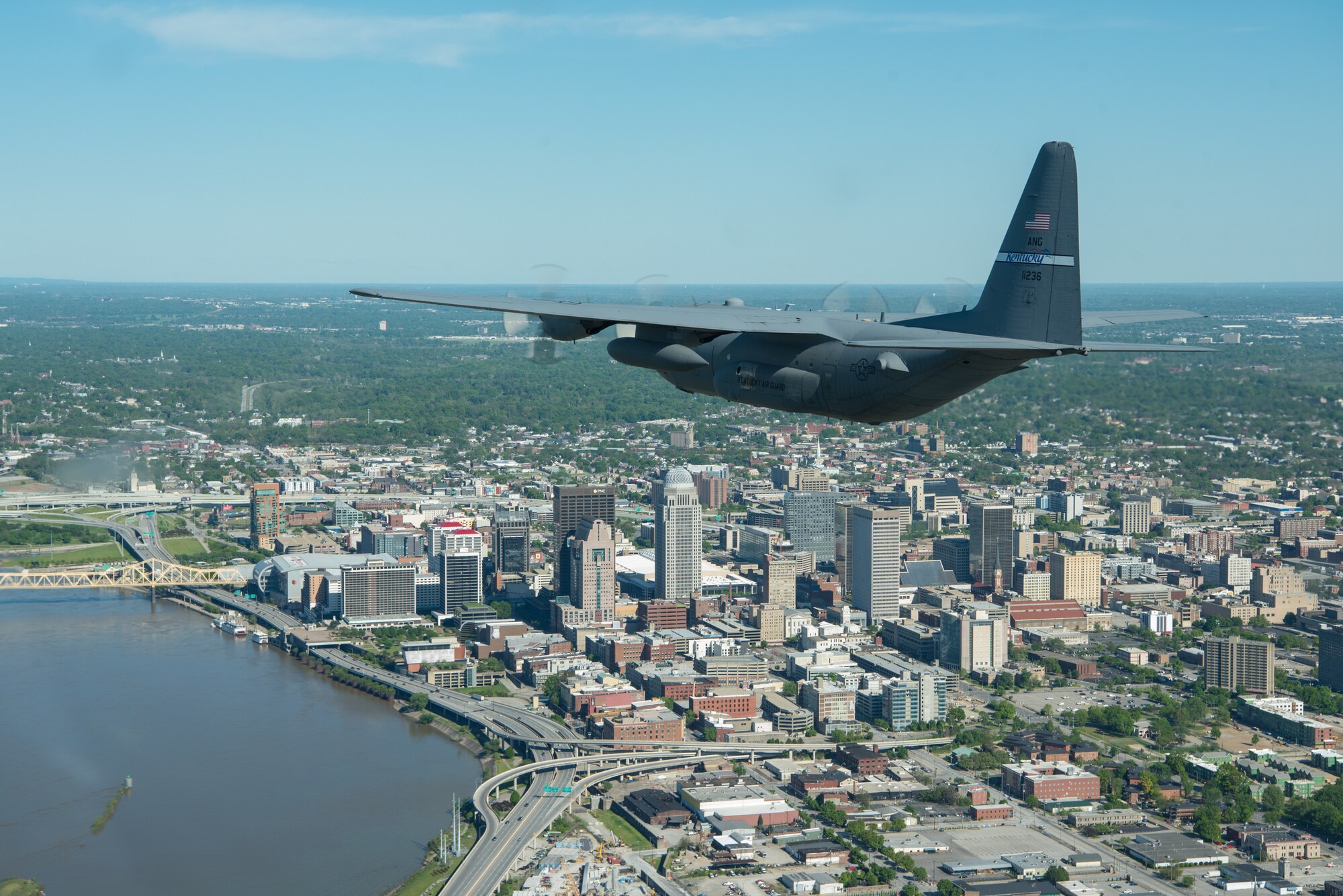 A Kentucky Air National Guard C-130 Hercules flies over the commonwealth of Kentucky as part of Operation American Resolve on Friday, May 1, 2020.  The 123rd Airlift Wing sent two C-130s for the aerial demonstration that is a nationwide salute to all those supporting COVID-19 response efforts. The flyover is intended to lift morale during a time of severe health and economic impacts that have resulted from COVID-19. (U.S. Air National Guard photo by Phil Speck)