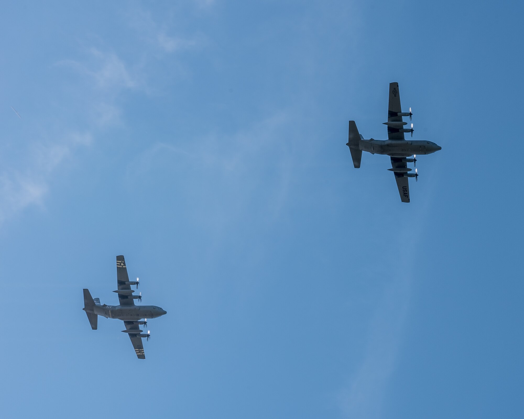 Two Kentucky Air National Guard C-130 Hercules aircraft from the 123rd Airlift Wing fly over Louisville, Ky., May 1, 2020, as part of Operation American Resolve, a nationwide salute to all those supporting COVID-19 response efforts. The operation is intended to lift morale during a time of severe health and economic impacts that have resulted from COVID-19. (U.S. Air National Guard photo by Staff Sgt. Joshua Horton)