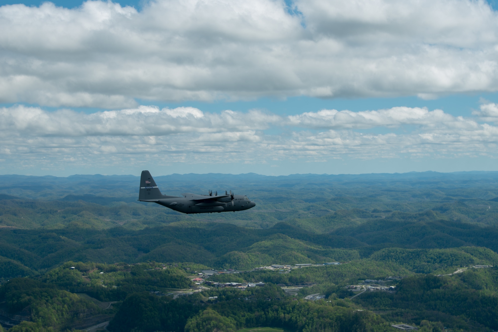 A Kentucky Air National Guard C-130 Hercules flies over the commonwealth of Kentucky as part of Operation American Resolve on Friday, May 1, 2020.  The 123rd Airlift Wing sent two C-130s for the aerial demonstration that is a nationwide salute to all those supporting COVID-19 response efforts. The flyover is intended to lift morale during a time of severe health and economic impacts that have resulted from COVID-19. (U.S. Air National Guard photo by Phil Speck)