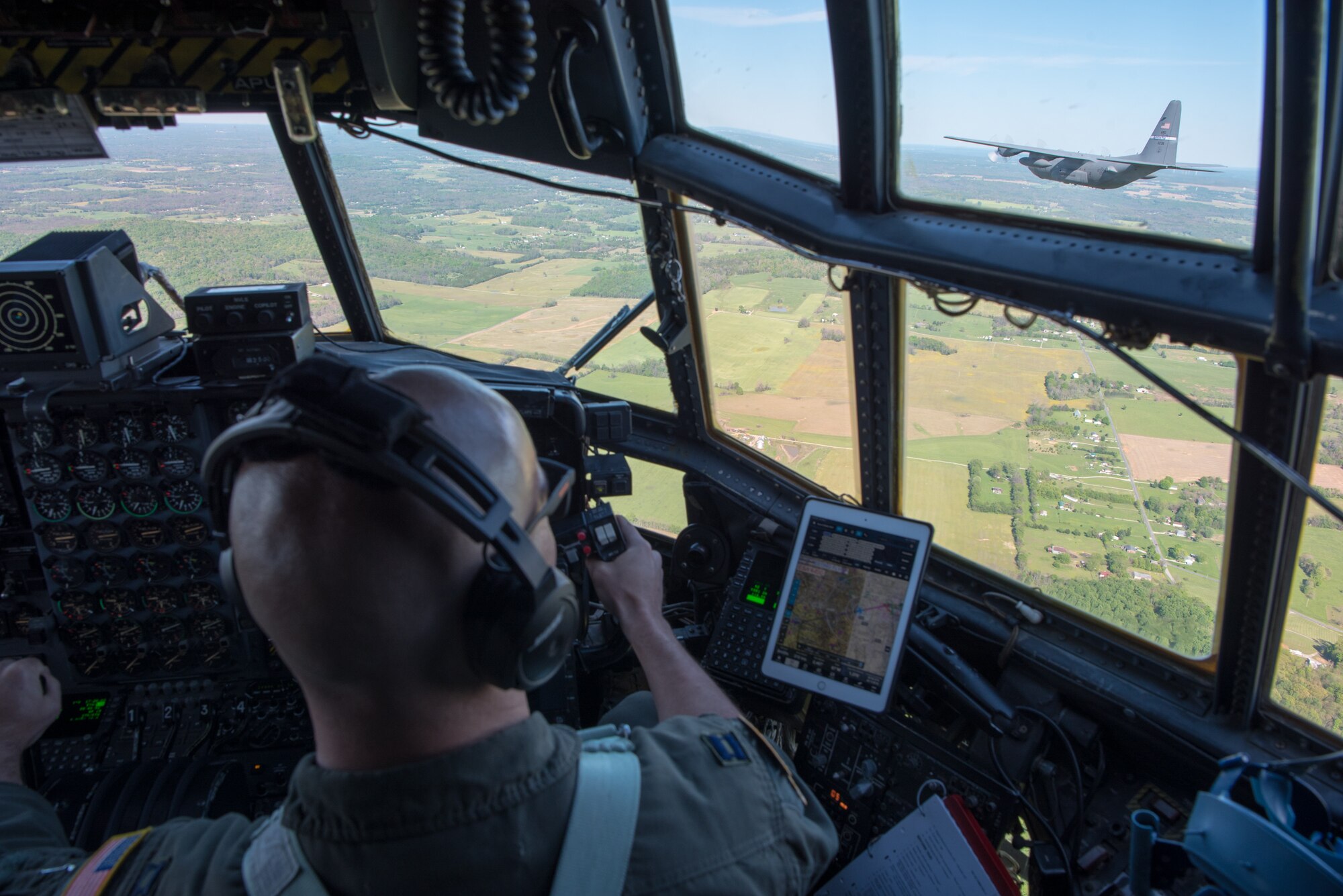 A Kentucky Air National Guard C-130 Hercules flies over the commonwealth of Kentucky as part of Operation American Resolve on Friday, May 1, 2020.  The 123rd Airlift Wing sent two C-130s for the aerial demonstration that is a nationwide salute to all those supporting COVID-19 response efforts. The flyover is intended to lift morale during a time of severe health and economic impacts that have resulted from COVID-19. (U.S. Air National Guard photo by Phil Speck)