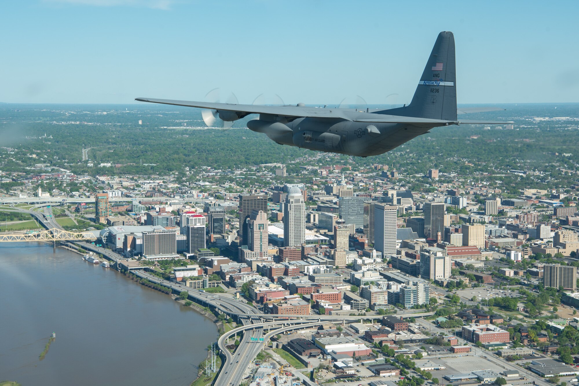 A Kentucky Air National Guard C-130 Hercules flies over the commonwealth of Kentucky as part of Operation American Resolve on Friday, May 1, 2020.  The 123rd Airlift Wing sent two C-130s for the aerial demonstration that is a nationwide salute to all those supporting COVID-19 response efforts. The flyover is intended to lift morale during a time of severe health and economic impacts that have resulted from COVID-19. (U.S. Air National Guard photo by Phil Speck)