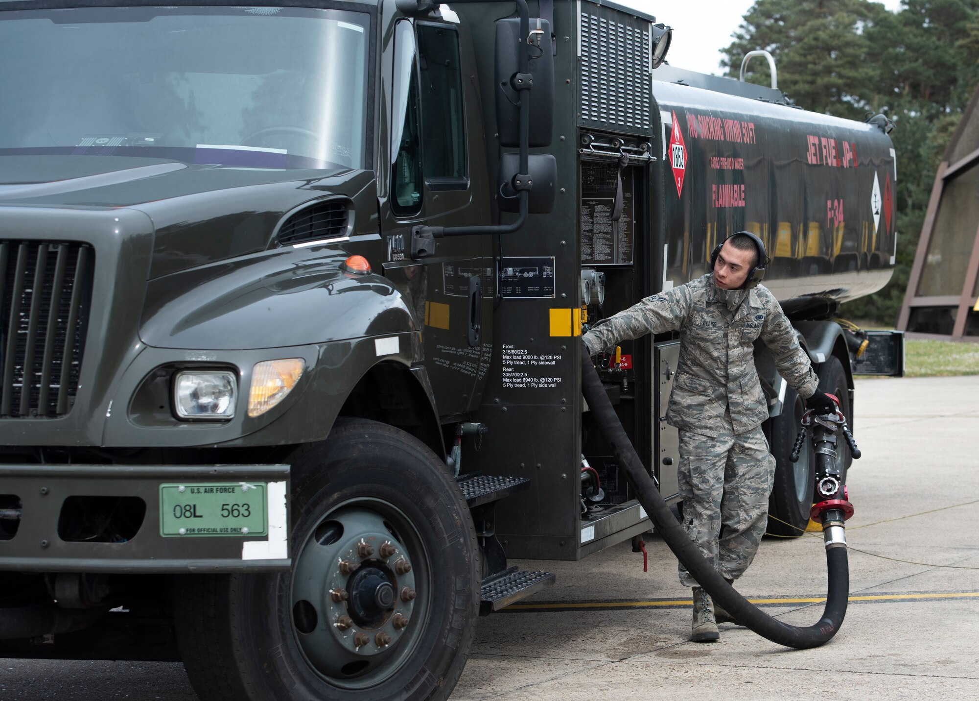 Airman 1st Class Issac Ellis, a 48th Logistics Readiness Squadron fuels mobile distribution operator, prepares to refuel an F-15C Eagle at Royal Air Force Lakenheath, England, April 30, 2020. The 48th LRS fuels management flight handles the storage and delivery of the various fuels, oils and lubricants that are required to keep our aircraft airborne and the Liberty Wing mission-ready, despite the current COVID-19 pandemic. (U.S. Air Force photo by Airman 1st Class Jessi Monte)
