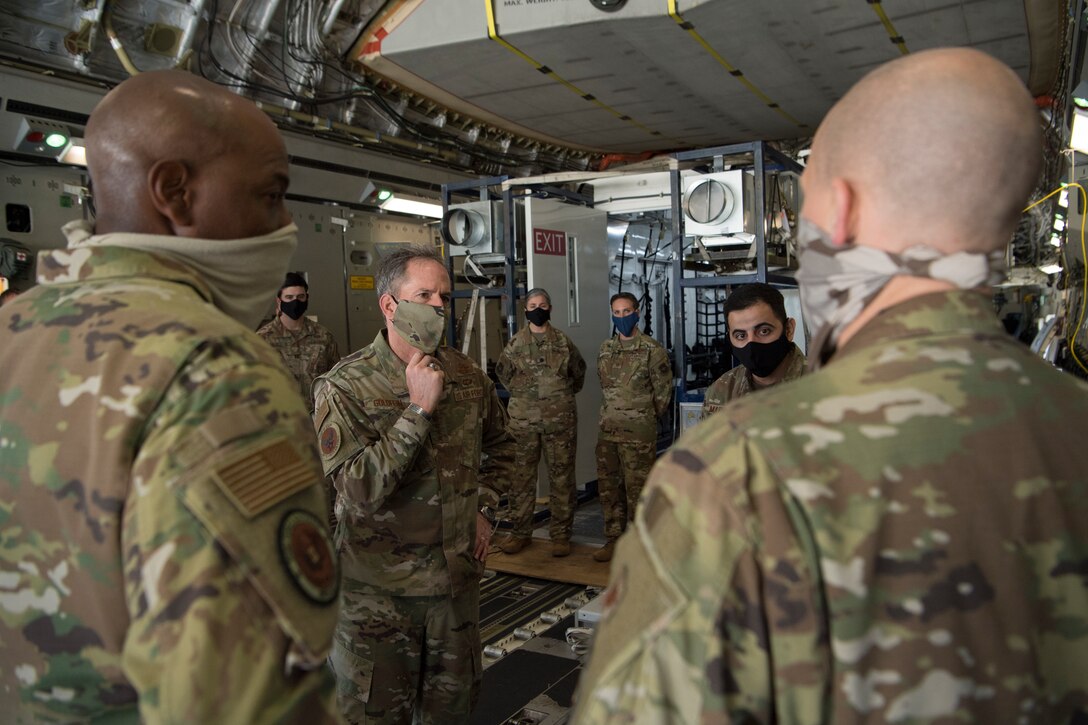 Air Force Chief of Staff Gen. David L. Goldfein listens to a brief by Lt. Col. Paul Hendrickson, Agile Combat Support Directorate's AF Chemical, Biological, Radiological, and Nuclear Defense Systems Branch materiel leader, about the rapid acquisition process and functional capabilities of a Negatively Pressurized Conex prototype at Joint Base Charleston, S.C., April 30, 2020. The NPC was developed and designed to fit inside both C-5 and C-17 aircraft to enable safe transport of up to 28 passengers, as well as teams of medical professionals to medical facilities around the globe. (U.S. Air Force photo by Staff Sgt. Chris Drzazgowski)