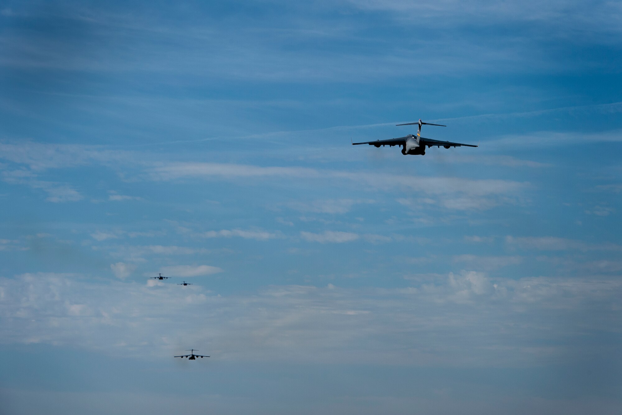 U.S. Air Force C-17 Globemaster IIIs assigned to the 58th Airlift Squadron, take off from Altus Air Force Base, Oklahoma, in support of essential personnel fighting COVID-19, May 1, 2020.