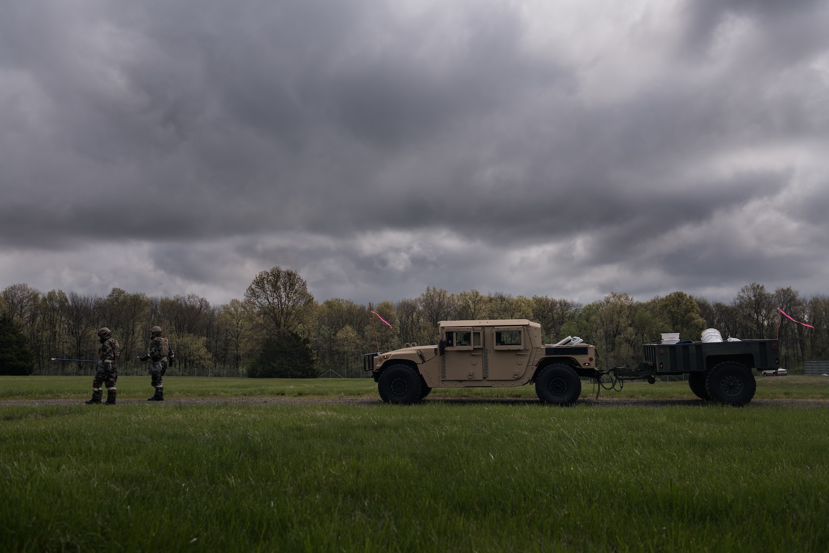 509th Engineer Squadron Explosive Ordinance Disposal technicians, walk towards a simulated chemical ordinance during training at Whiteman Air Force Base, Missouri, April 30, 2020. During the COVID-19 pandemic Whiteman’s EOD team remains mission capable and are ready to respond to threats throughout the region. (U.S. Air Force photo by Senior Airman Thomas Barley)