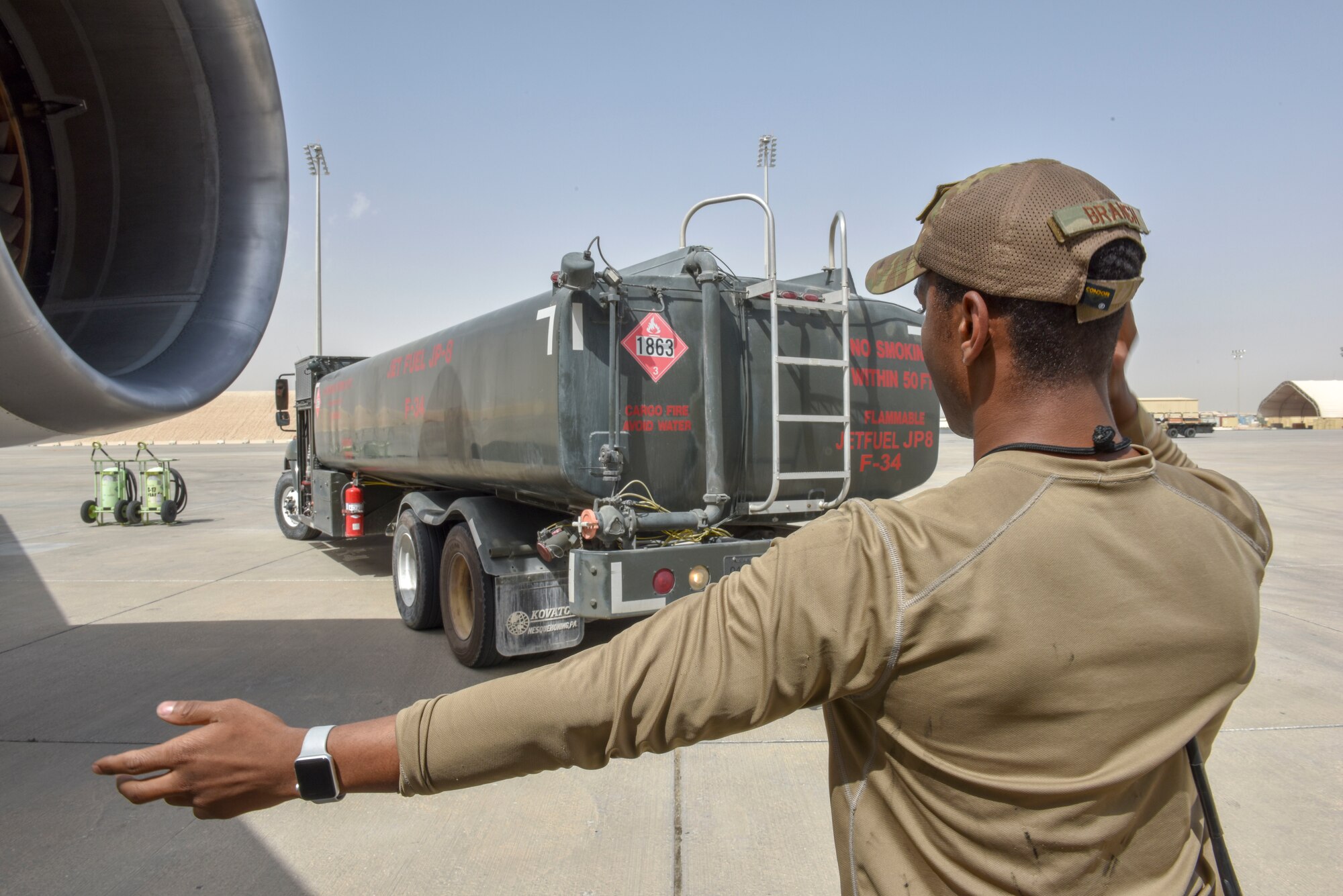 Airmen with the 8th Expeditionary Air Mobility Squadron move cargo on the flightline at Al Udeid Air Base, Qatar on April 28, 2020. The 8 EAMS Airmen support dozens of missions per day, often moving hundreds of thousands of pounds of cargo and service members around the U.S. Air Forces Central Command area of responsibility. (U.S. Air Force photo by Tech. Sgt. John Wilkes)