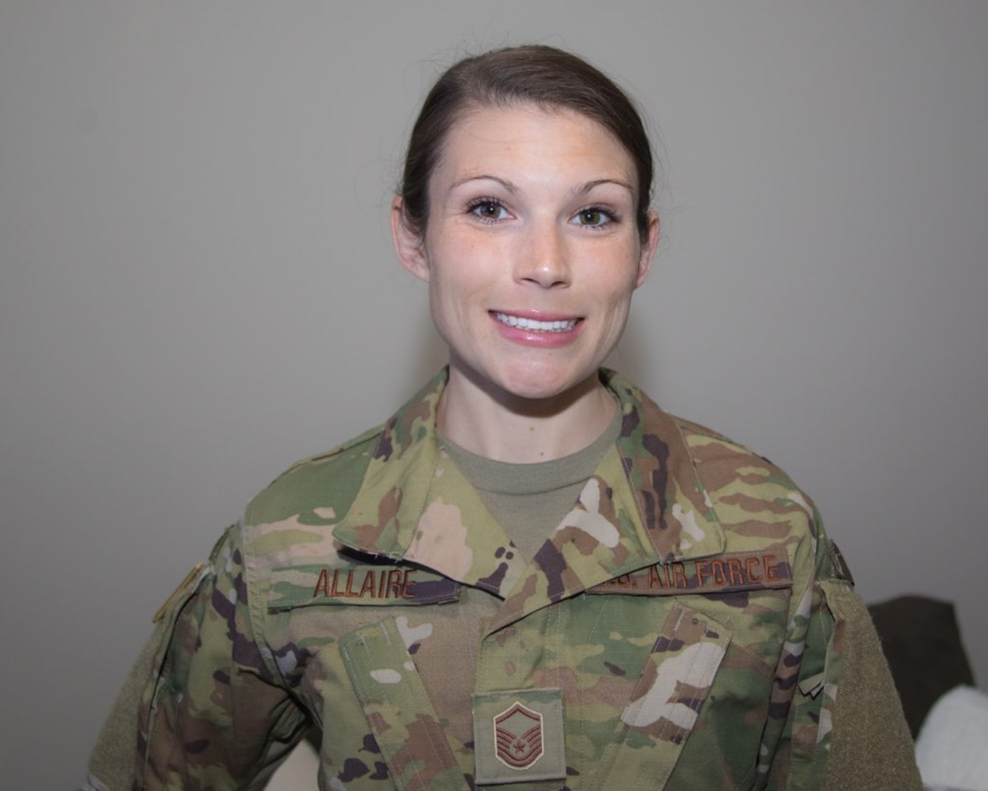 Master Sgt. Danielle Allaire, 41st Aerial Port Squadron air transportation specialist, passenger service noncommissioned officer in charge, poses for a photo. Allaire is a travel nurse in her civilian career and is currently working with COVID-19 patients. (courtesy photo)