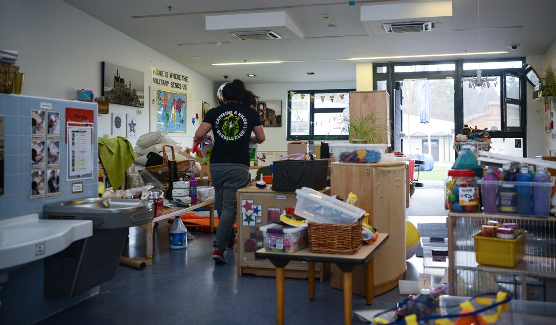 Mimmie Lammey, Child Development Center youth program assistant, walks through a room in the child development center at Ramstein Air Base, Germany, March 18, 2020.