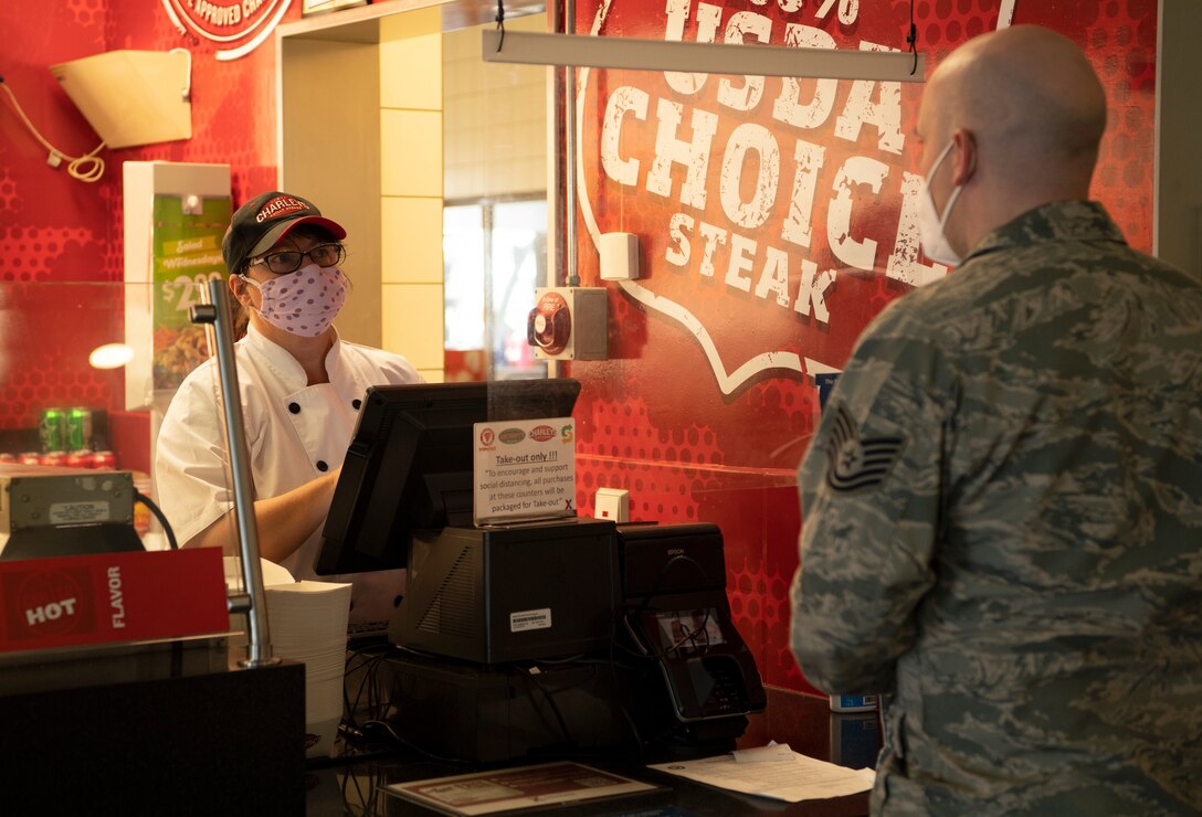 The Exchange implemented new policies during the COVID-19 pandemic including encouraging cashless transactions, wearing face covers and gloves, and more frequent cleaning of carts and other high-traffic areas