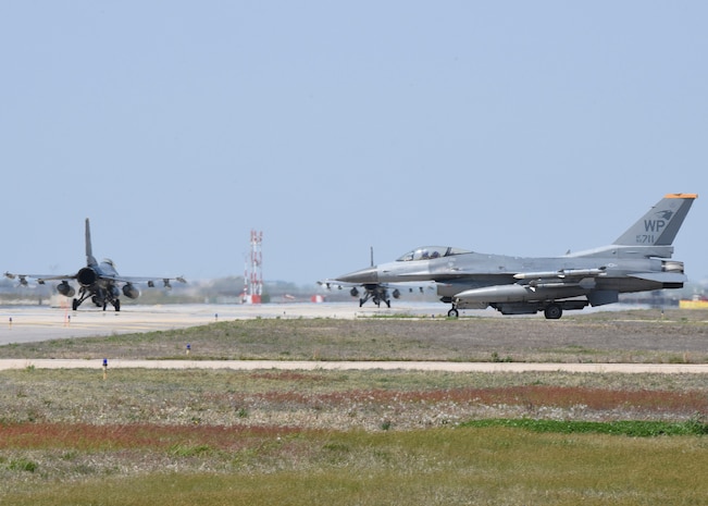 U.S. Air Force Lt. Gen. Ken Wilsbach, 7th Air Force commander, taxis to the runway in an F-16 Fighting Falcon aircraft before a routine training flight at Kunsan Air Base, Republic of Korea, April 30, 2020. Wilsbach joined Col. Tad Clark, 8th Fighter Wing commander, for a routine training flight in an F-16. (U.S. Air Force photo by Staff Sgt. Anthony Hetlage)