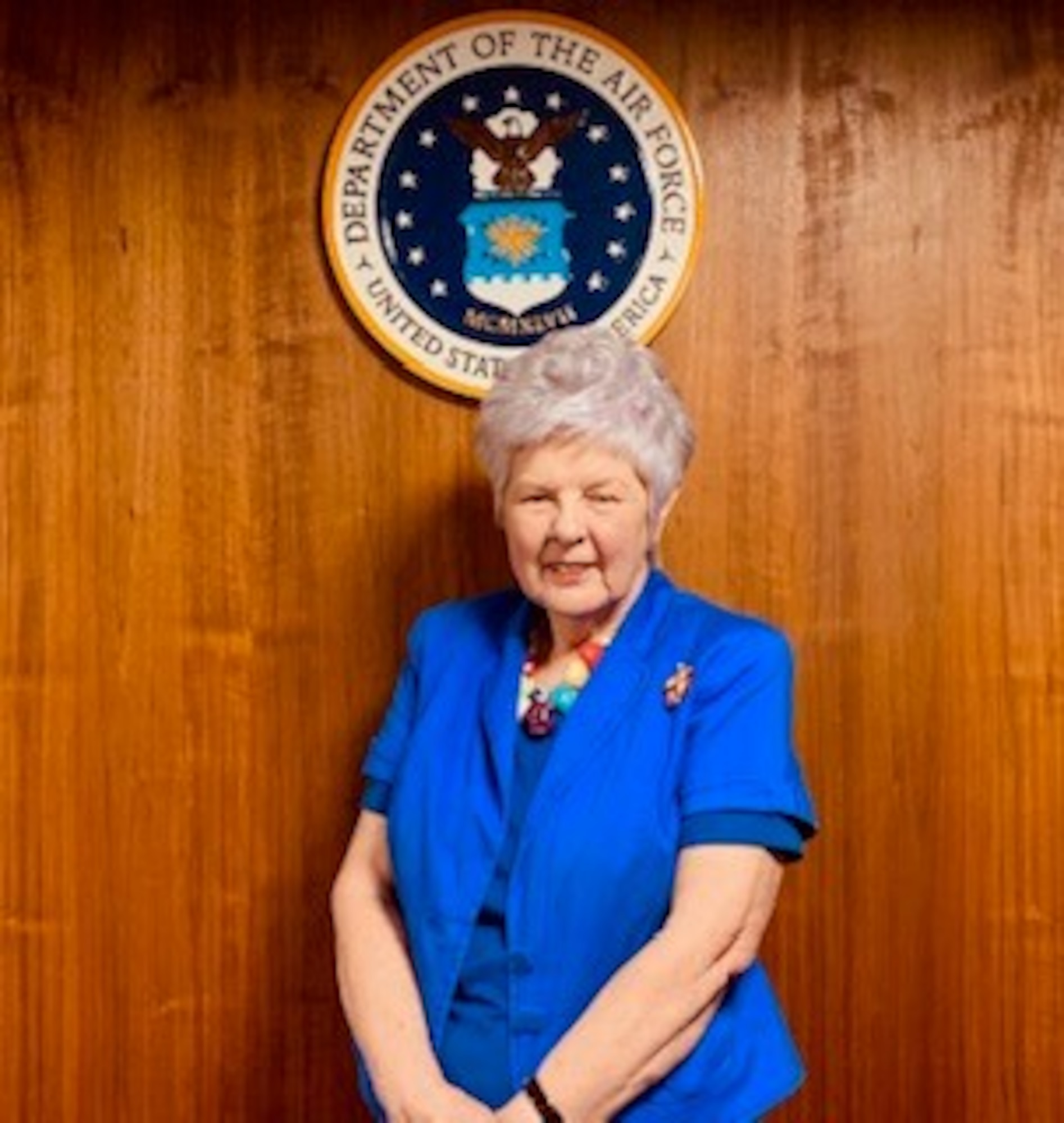 Valerie Lucas, 501st Combat Support Wing Legal Office British liaison officer, poses for a photo as she celebrates her 59th year of service at RAF Alconbury, England, April 24, 2020. Lucas has continued to reinforce the base’s ties and communication with the local authorities and serve as the helping hand for base personnel as they navigate issues in a foreign country. (Courtesy Photo)