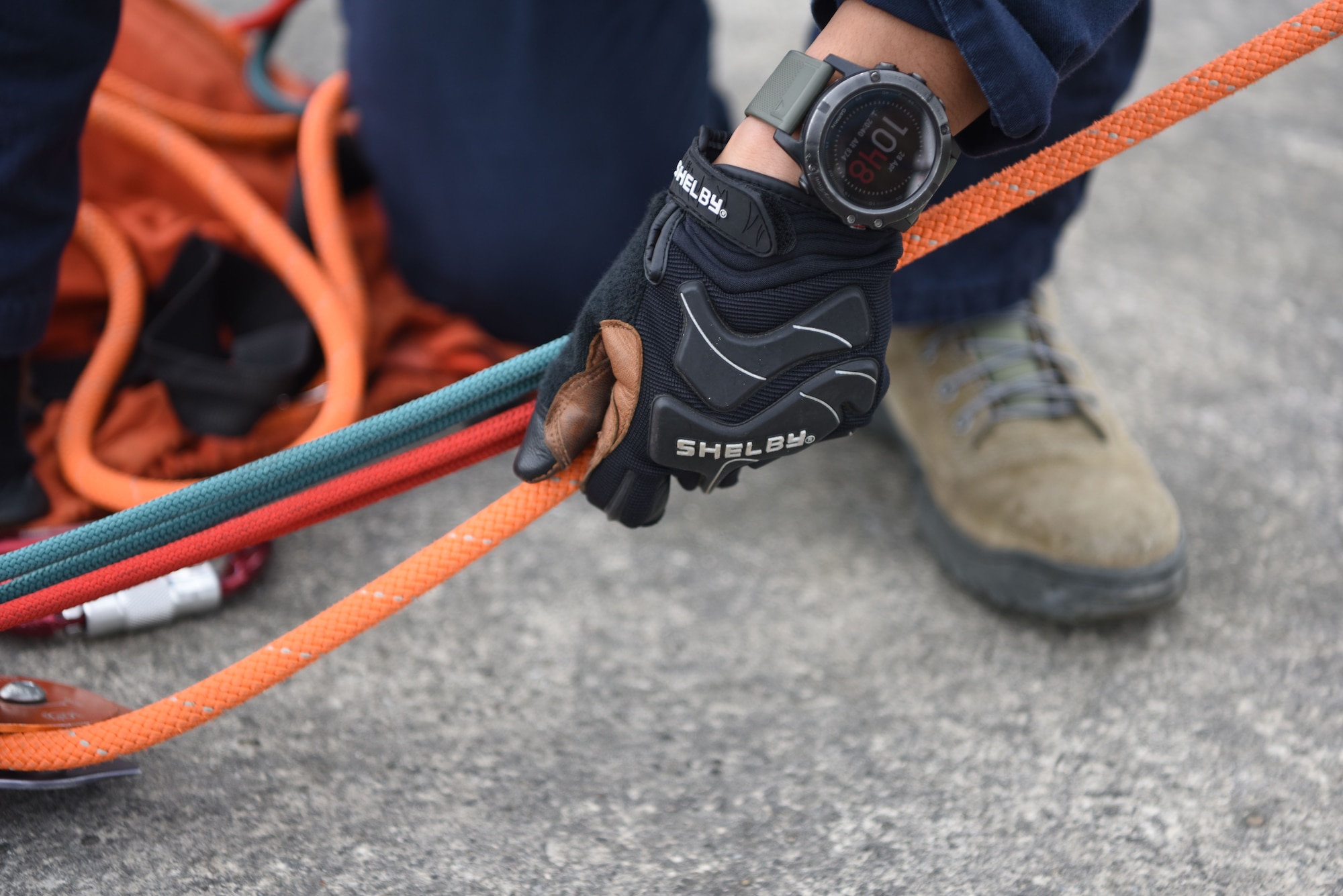 U.S. Air Force Airman 1st Class Philip Mathys, 86th Civil Engineer Squadron firefighter, grips a safety line during a rescue certification course.