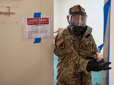 Sgt. 1st Class Brian Tomasek with the West Virginia National Guard’s Task Force Chemical, Biological, Radiological and Nuclear (CBRN) Response Enterprise collects swabs from a conference room after it was sanitized with a Aerosolized Hydrogen Peroxide system as part of a demonstration of its disinfection capabilities at the West Virginia Capitol Complex in Charleston, West Virginia, April 29, 2020.