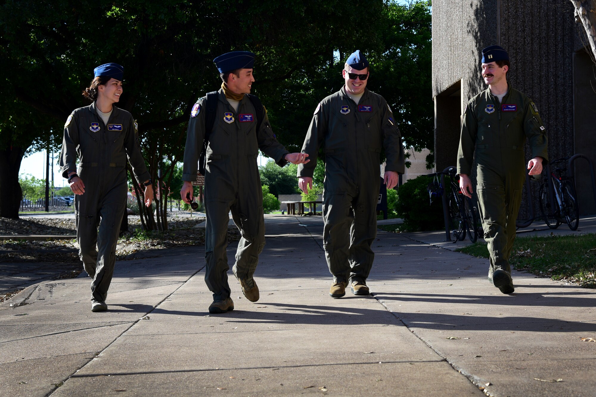 First Lt. Kimberly Bray, Capt. Joshua White, 1st Lt. Max Kaslon and Capt. Mike Beachamp, 434th Flying Training Squadron instructor pilots, walk out from work together after a long day of training, April 23, 2020 at Laughlin Air Force Base, Texas. White says it’s important to have a support group, whether one is a student or otherwise. “At times my support network is the only thing that keeps me pressing forward,” White said. “A network of people who understand what I’m going through and are not afraid to ask the tough questions or tell me what I need to hear--not what I want to hear. They have helped me get through the tough times and kept me focused on the big picture.” (U.S. Air Force photo by Senior Airman Anne McCready)