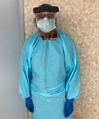 Dr. (Maj.) Sanjiv Baxi, 349th Medical Group doctor, poses for a photo in his personal protective gear in New York City April 28, 2020. Baxi volunteered to help fight COVID19 when Air Force Reserve Command was looking for Citizen Airmen to support the DoD initiative with FEMA. Baxi also teaches epidemiology at University of California San Francisco. (U.S. Air Force courtesy photo)