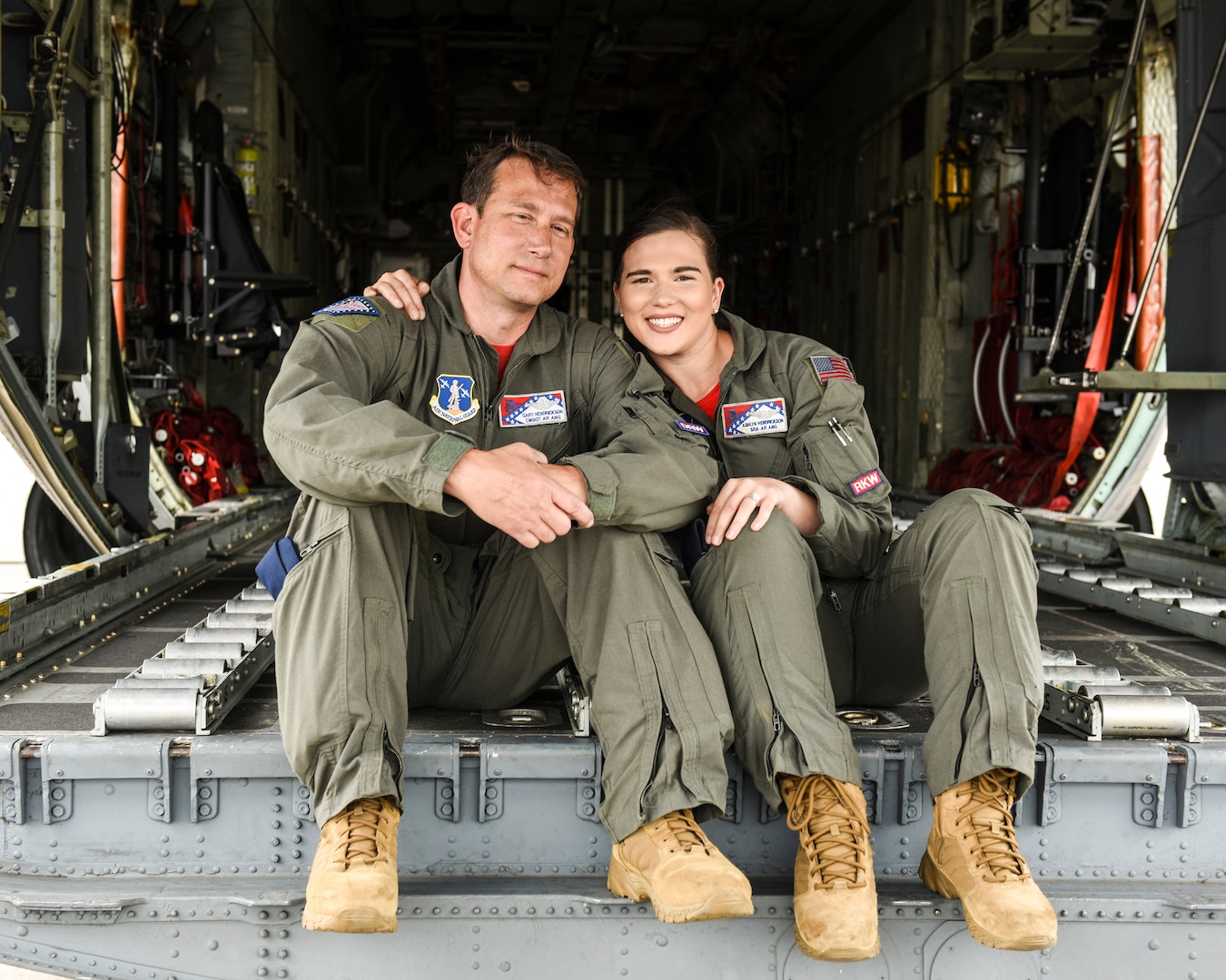Chief Master Sgt. Gary Hendrickson and Senior Airman Ashlyn Hendrickson, both loadmasters assigned to the 154th Training Squadron, inside a C-130H at Little Rock Air Force Base, Arkansas. The father-daughter duo love flying and provide vital support in their role as C-130H loadmasters.
