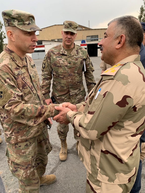 U.S. Army Brig. Gen. Howard Geck, commanding general, 103rd Expeditionary Sustainment Command, visited Iraqi Army Brig. Gen. Mae'n, Iraqi Army National Western Track Repair Facility commander, at Camp Taji, Iraq, Feb. 24, 2020.  Geck also toured the General Dynamics Land Systems facility where they conduct maintenance operations on the M1A1 Main Battle Tank and the M88 Recovery Vehicle. 



Accompanying Geck was Col. Gerald Newman, 108th Sustainment Brigade commander, Task Force Lincoln, Team Blackhawks, Illinois Army National Guard, who are executing the logistics advise, assist, and enable mission under the 1st Theater Sustainment Command supporting Combined Joint Task Force - Operation Inherent Resolve to continue building the sustainment capability of the Iraqi Security Forces. (U.S. Army National Guard photo by Capt. Richard Wharton)