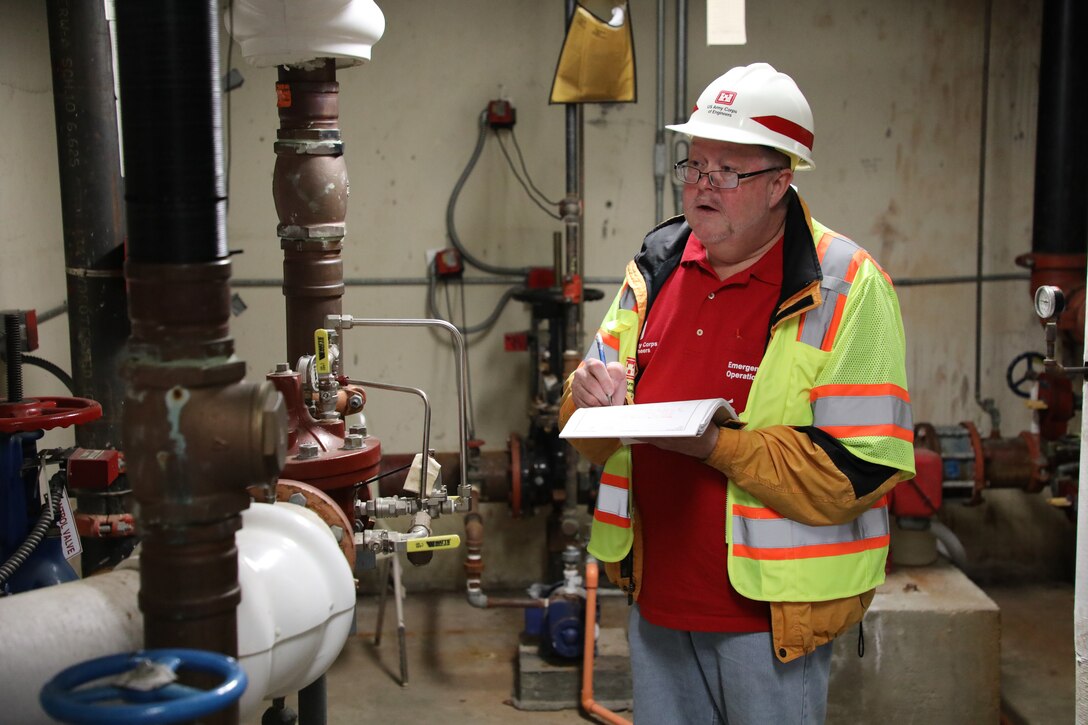 Brian Erbstosesser, fire protection engineer, U.S. Army Corps of Engineers – Omaha District, inspects the boiler room during a site assessment of a building in Omaha, Neb., the state is considering turning into an alternate care facility in the battle against the COVID-19 pandemic. When requested by states and/or territories and funded by FEMA, USACE is conducting site assessments for potential alternate care facilities. A site assessment does not guarantee construction at that site.