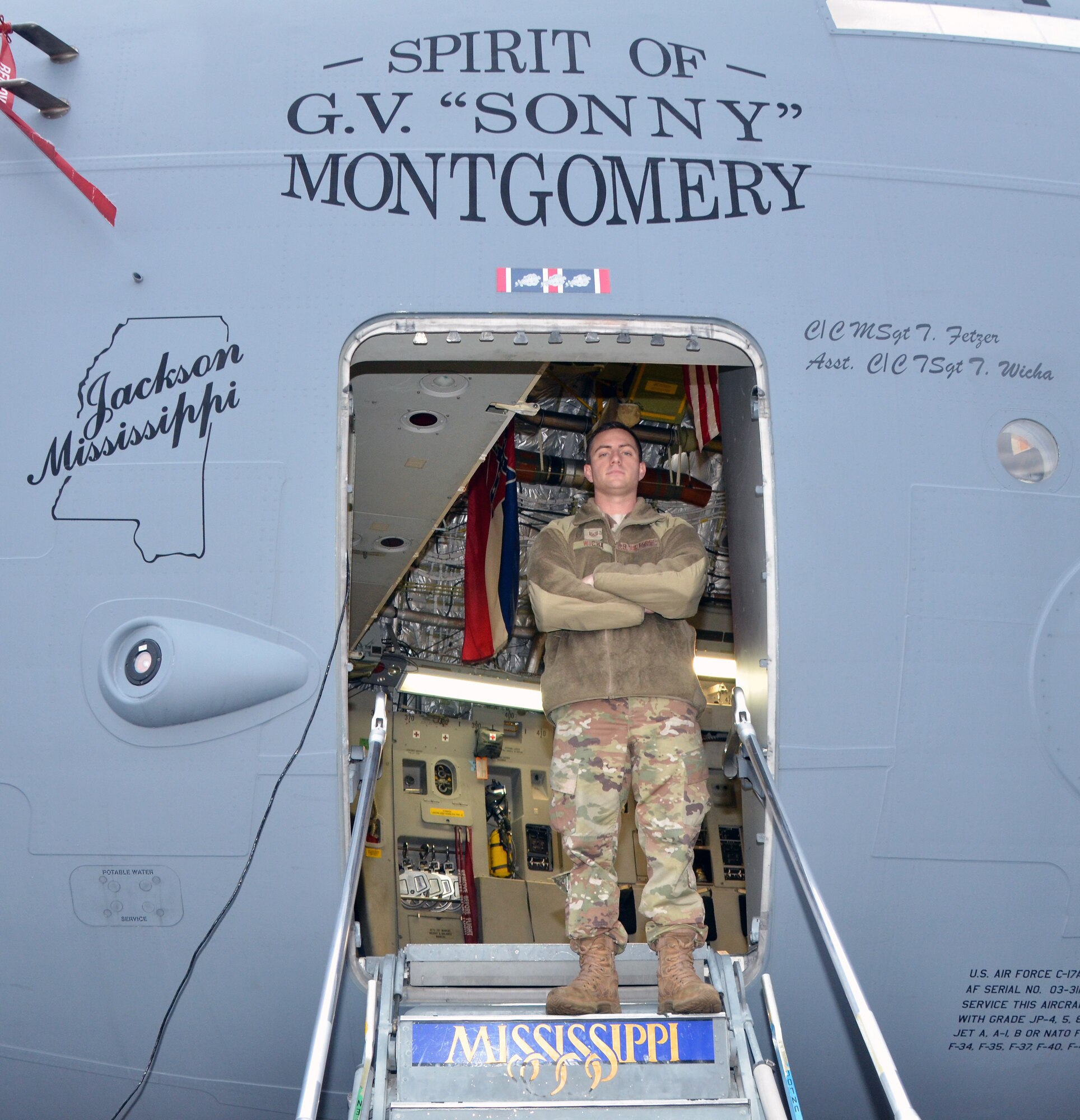 The 172d Aircraft Maintenance Squadron’s Technical Sergeant Todd M. Wicha poses for a photo in the C-17 Globemaster III that features his name January 29, 2020, Thompson Field, Jackson, Miss. Wicha is a crew chief and has served in the Mississippi Air National Guard for nine years. (U. S. Air National Guard photo by Master Sgt. Betsy J. Winstead/Released)