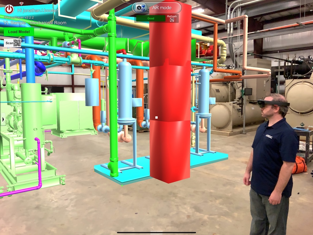 Kelly Irvin of the U.S. Army Engineer Research and Development Center uses augmented reality technology developed in the Information Technology Laboratory to inspect a mock boiler room. The software is being used across the nation to assess potential sites for COVID-19 alternate care facilities, while limiting the number of people who have to physically examine the facilities.