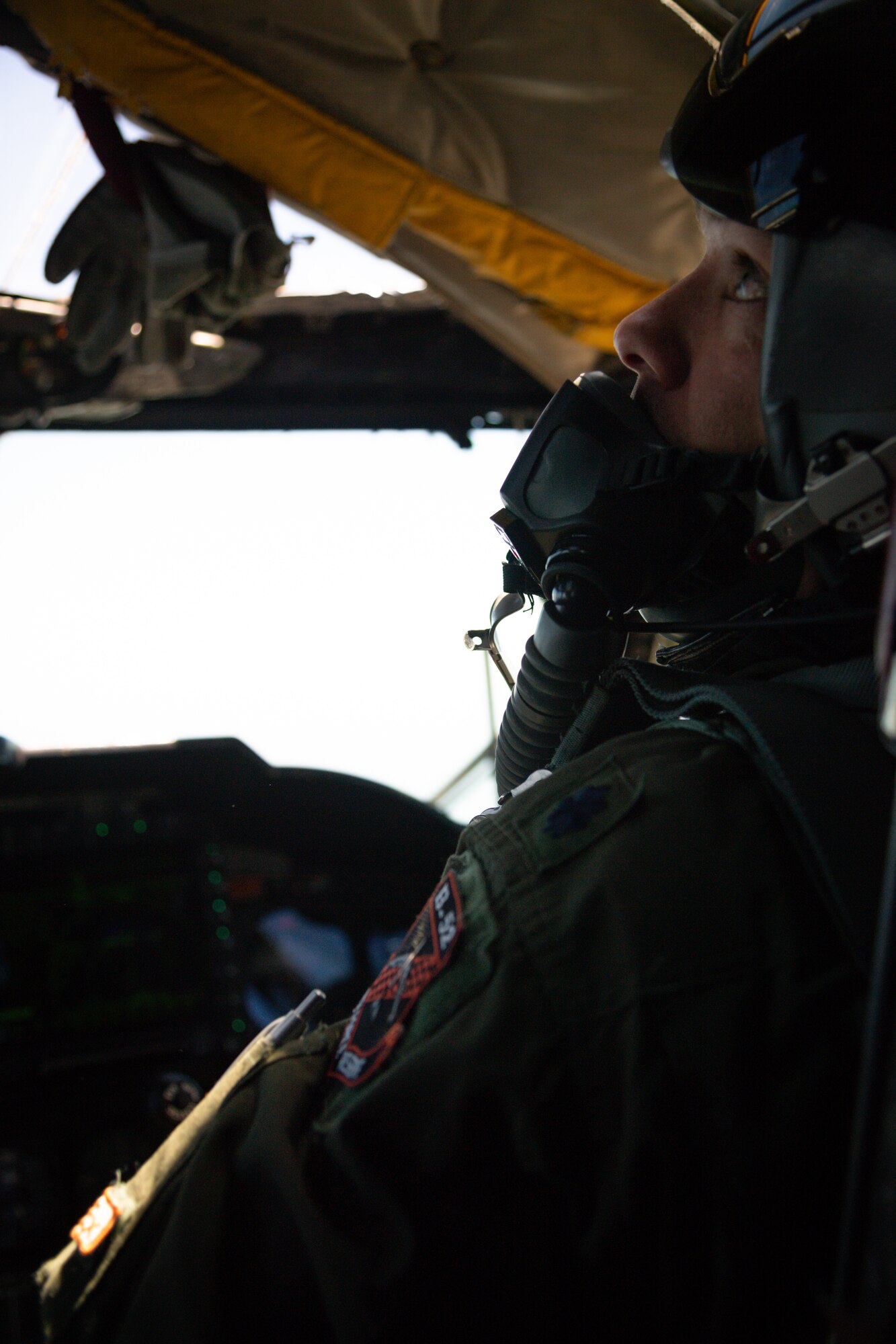 Lt. Col. Ryan Decker, 343rd Bomb Squadron director of operations, scans the horizon from a B-52H Stratofortress flying out of Barksdale Air Force Base, La., May 1, 2020.