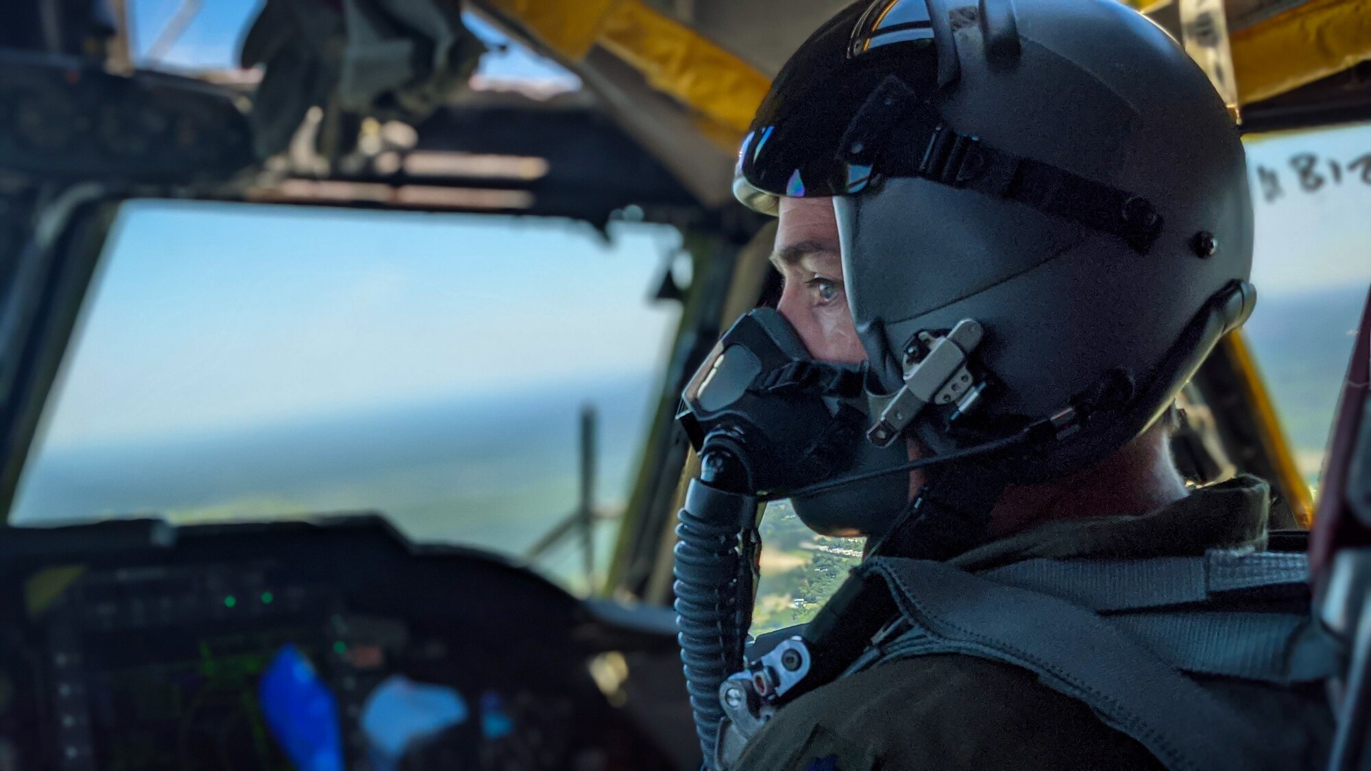 Lt. Col. Ryan Decker, 343rd Bomb Squadron director of operations, scans the horizon from a B-52H Stratofortress flying out of Barksdale Air Force Base, La., May 1, 2020.