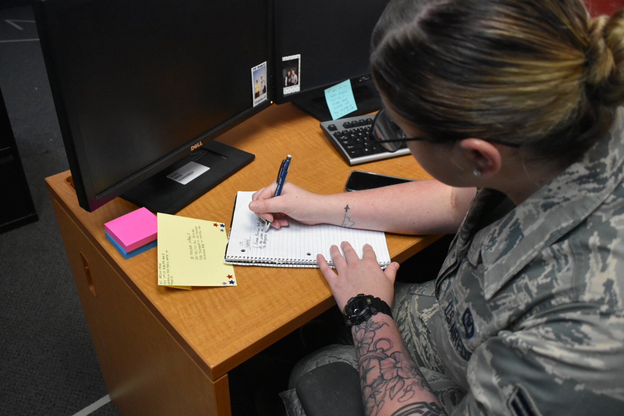 Airman 1st Class Cailey Brislin, 434th Squadron Aviation Resource Management (SARM) at Laughlin Air Force Base, Texas, writes to Basic Military Training Airmen at Lackland Air Force Base to offer support and words of wisdom. Brislin began Letters to Lackland in April, and has since gathered more than 50 of her fellow Airmen from around the world to send mail to basic trainees. (U.S. Air Force photo by 2nd Lt. Rachael Parks)