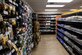 A view down the isle of the military clothing sales merchandise lines the shelves of the brand new military clothing store at Creech Air Force Base.