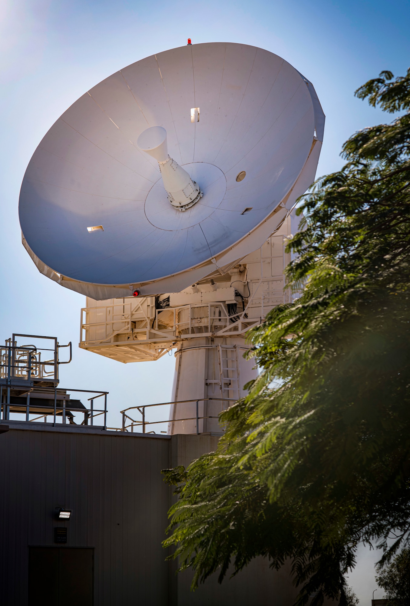 A C-Band space surveillance radar system, owned by the U.S. Air Force, operates as a dedicated sensor node at NCS Harold E. Holt, near Exmouth, Australia. Strategically located to cover both the southern and eastern hemisphere, the C-Band radar provides tracking and identification of space assets and debris for the U.S. space surveillance network. (U.S. Navy photo by Mass Communication Specialist 2nd Class Jeanette Mullinax)