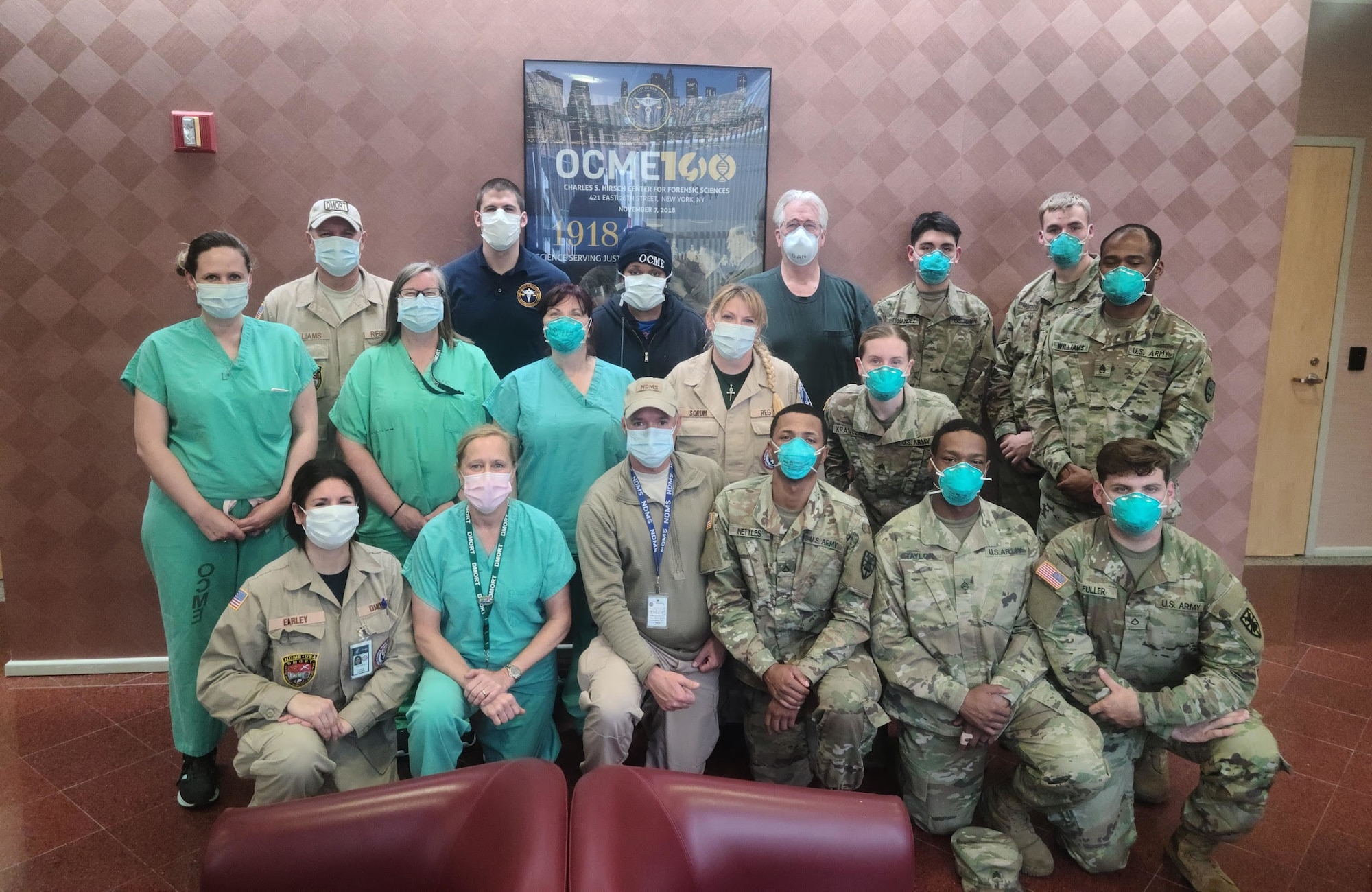 Members of the New York City Office of Chief Medical Examiner, the New York Army National Guard and the Health and Human Services Disaster Mortuary Operational Response Team at the New York medical examiner's office in April 2020. Lt. Col. Simpson, the Headquarters Washington Air National Guard’s director of force support, worked on this team as a DMORT medicolegal investigator as part of the Health and Human Services COVID-19 response.