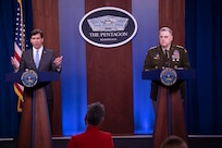 Esper and Milley speak at podiums.