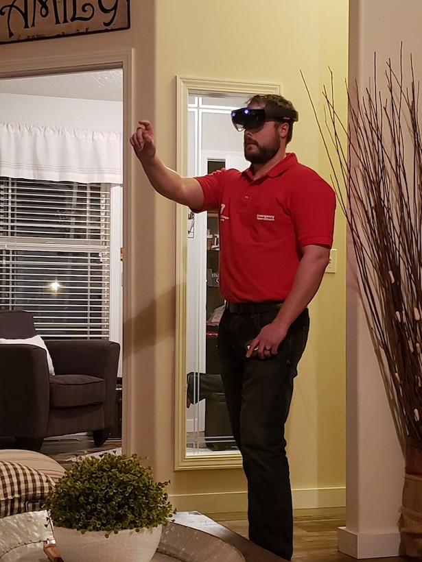Caleb Willard, an engineer with the U.S. Army Corps of Engineers Walla Walla District, uses augmented reality tools developed at the U.S. Army Engineer Research and Development Center to assess a potential site for a COVID-19 alternate care facility from home.