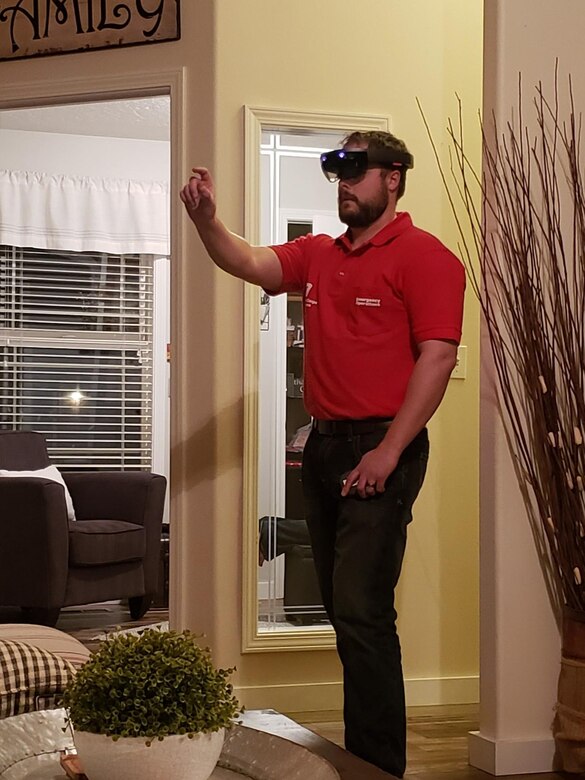 Caleb Willard, an engineer with the U.S. Army Corps of Engineers Walla Walla District, uses augmented reality tools developed at the U.S. Army Engineer Research and Development Center to assess a potential site for a COVID-19 alternate care facility from home.