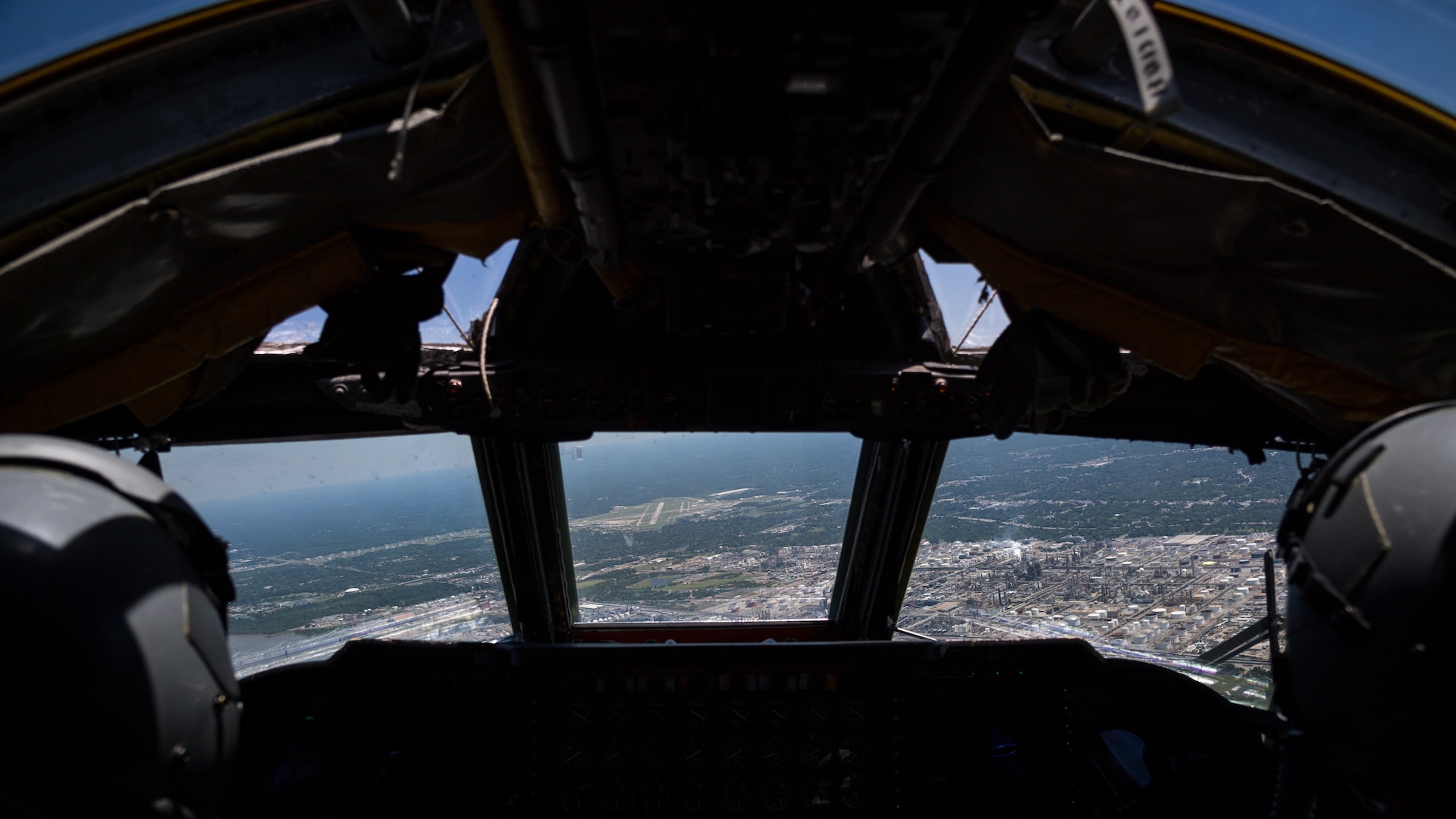 Lt. Col. Michael Green, 343rd Bomb Squadron commander, and Lt. Col. Ryan Decker, 343rd BS director of operations, guide a B-52 Stratofortress over the Louisiana state capitol building in Baton Rouge, May 1, 2020.