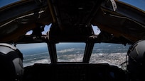 Lt. Col. Michael Green, 343rd Bomb Squadron commander, and Lt. Col. Ryan Decker, 343rd BS director of operations, guide a B-52 Stratofortress over the Louisiana state capitol building in Baton Rouge, May 1, 2020.