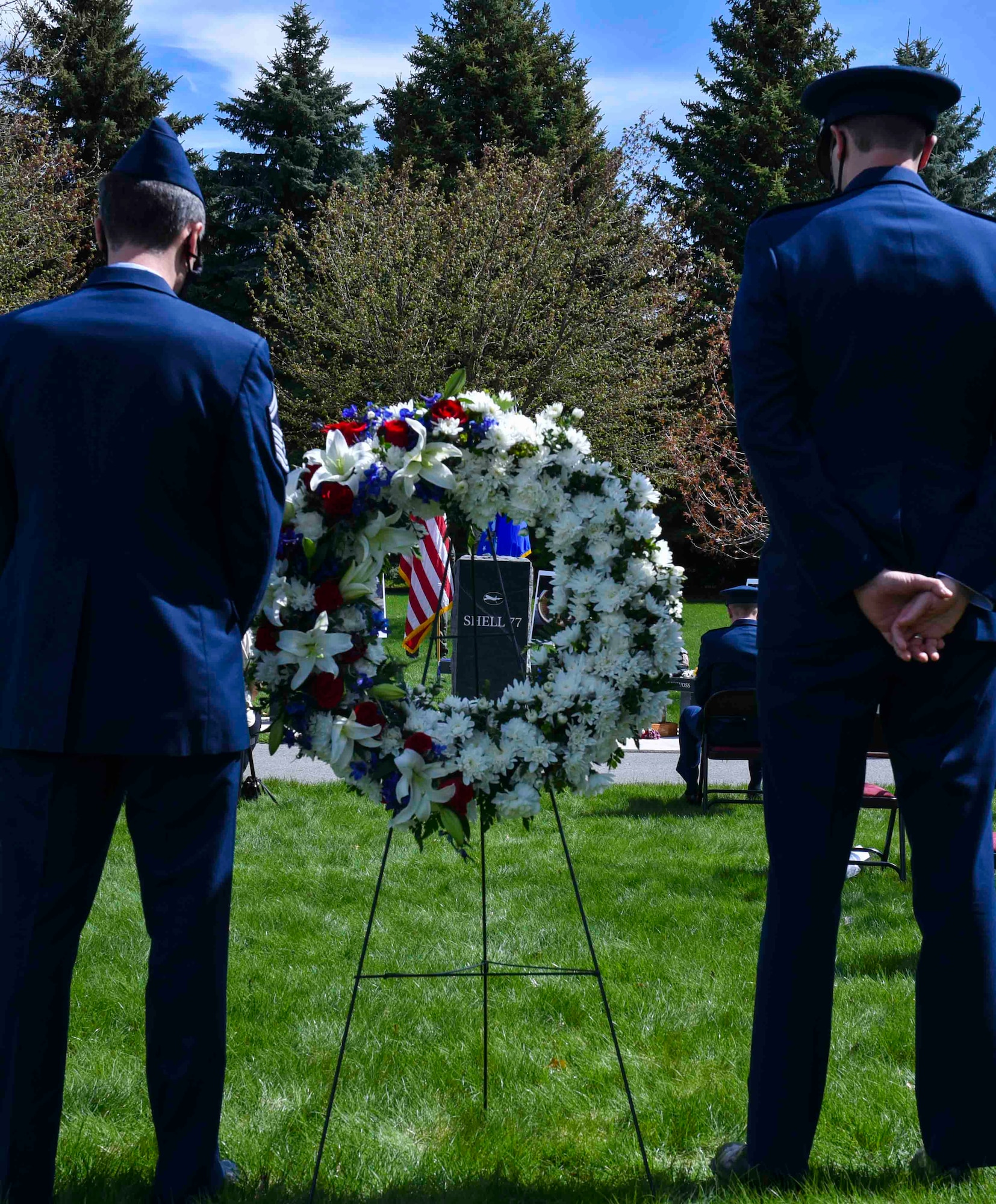U.S. Air Force Lt. Col. Kevin Parsons, 93rd Air Refueling Squadron commander, and Senior Master Ryan Sgt. Clauss, 93rd Air Refueling Squadron superintendent, pause for a moment of silence during the Shell 77 Memorial, May 4, 2020, on Fairchild Air Force Base, Wash.
