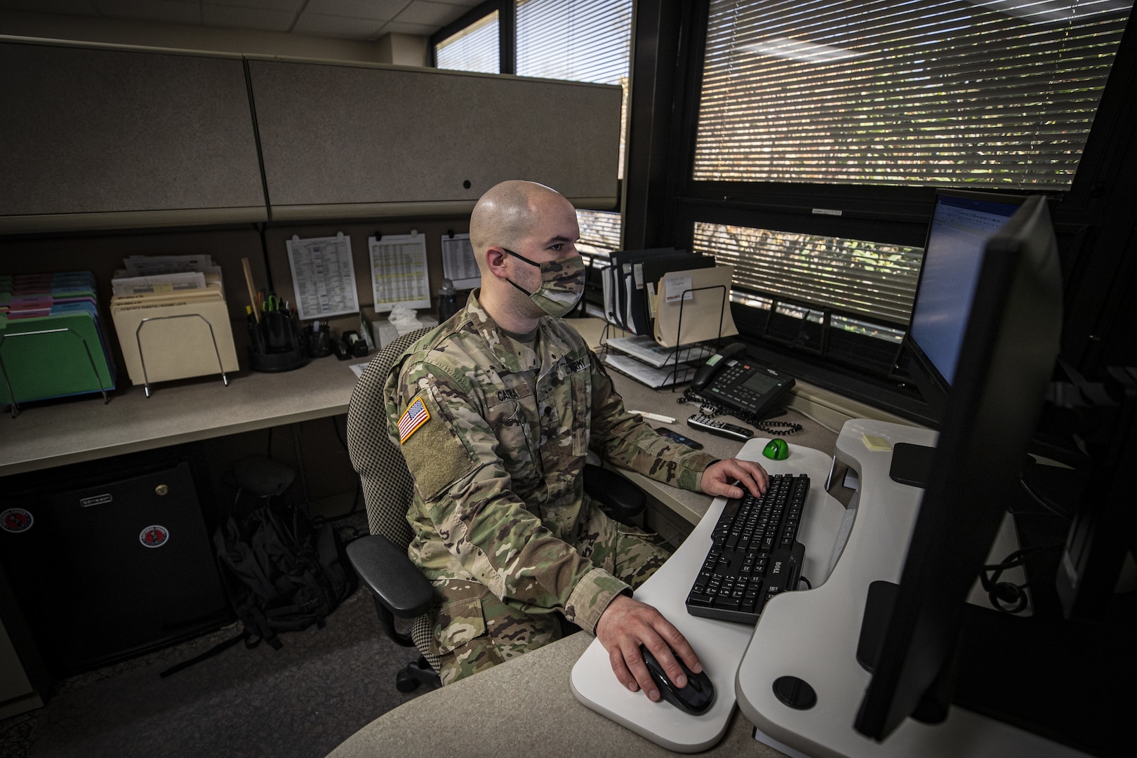 U.S. Army Spc. Benjamin Castria works in the New Jersey National Guard’s Joint Operations Center in the Homeland Security Center of Excellence, Lawrenceville, N.J., April 22, 2020.