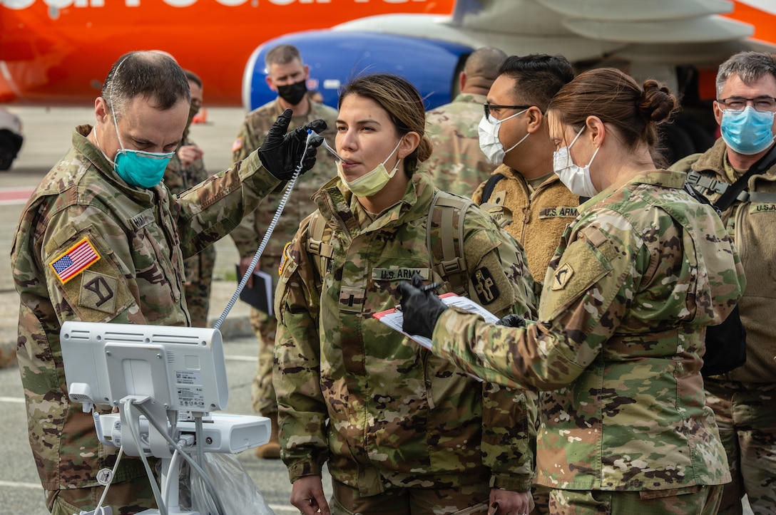 Soldiers with the 94th CSH arrive at Hanscom  Air Force Base