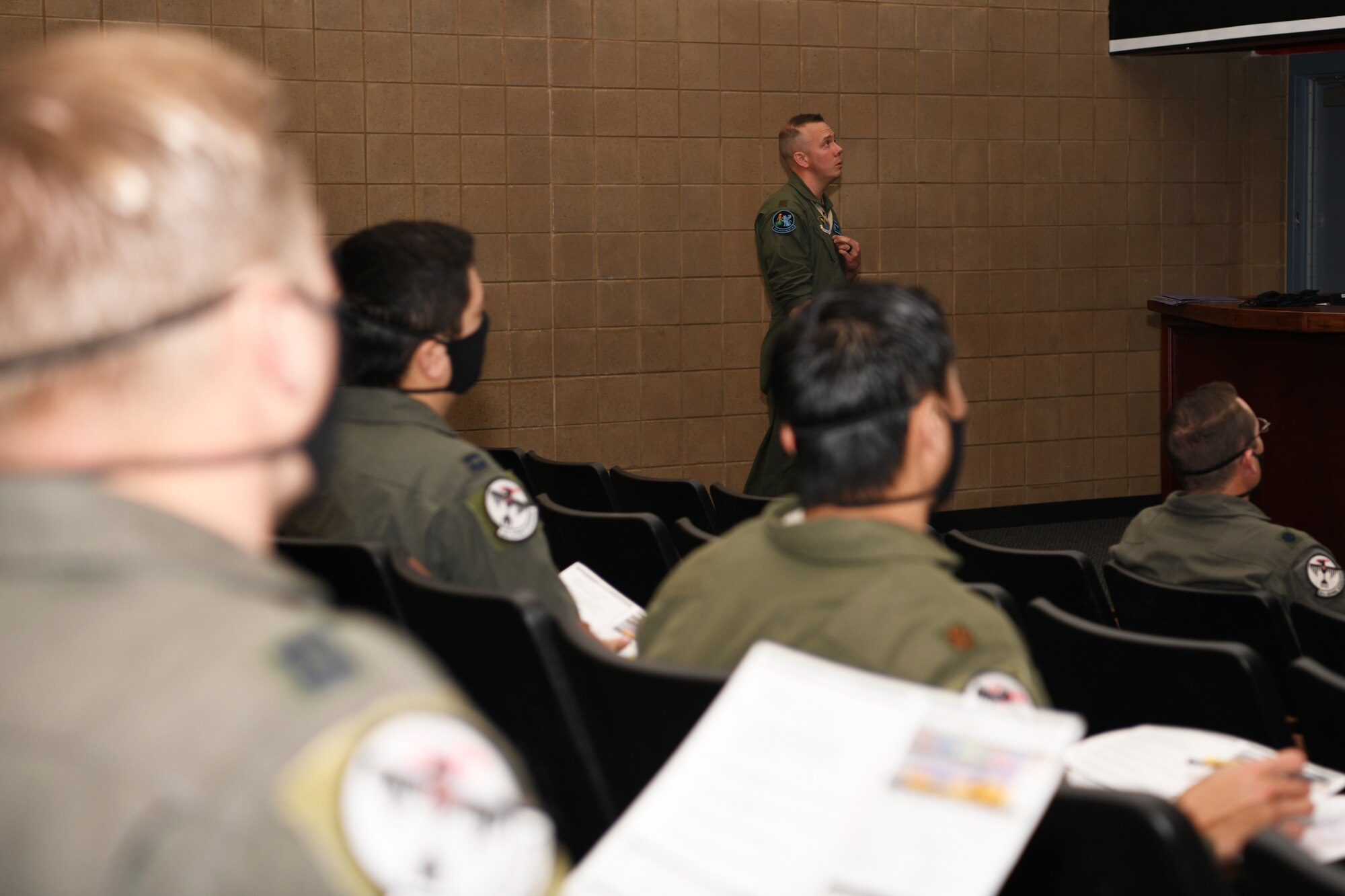 The 28th Bomb Wing weapons officer briefs 34th Bomb Squadron aircrews prior to departure on a non-stop deployment from Ellsworth Air Force Base, S.D., May 3, 2020. The B-1B Lancer demonstrates the global strike capacity and ability of the U.S. Air Force and Air Force Global Strike Command to forward deploy, and deliver precision-guided ordnance against any adversary anytime, anywhere. (U.S. Air Force photo by Senior Airman Nicolas Z. Erwin)