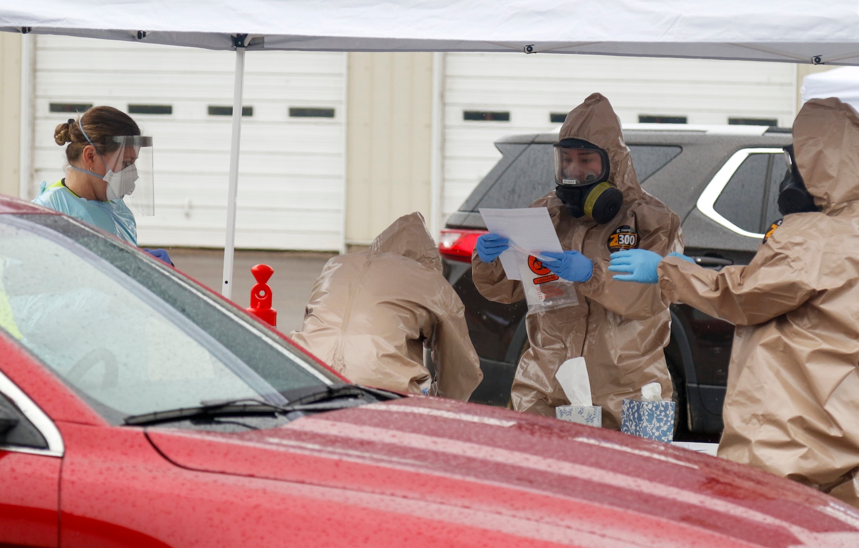 Three Wisconsin National Guard Soldiers and Airmen and one local medical professional help facilitate mobile testing in Buffalo County, Wisconsin, May 1, 2020.