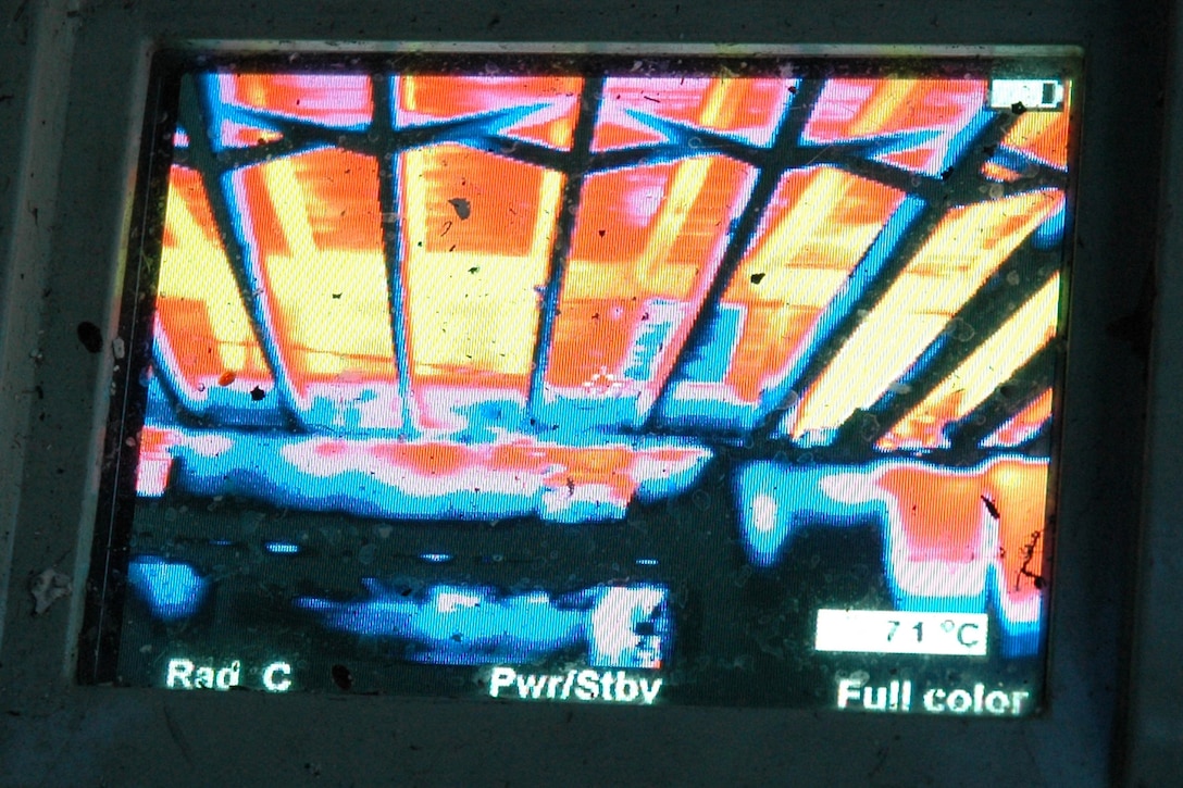 A thermal image shows a house fire.